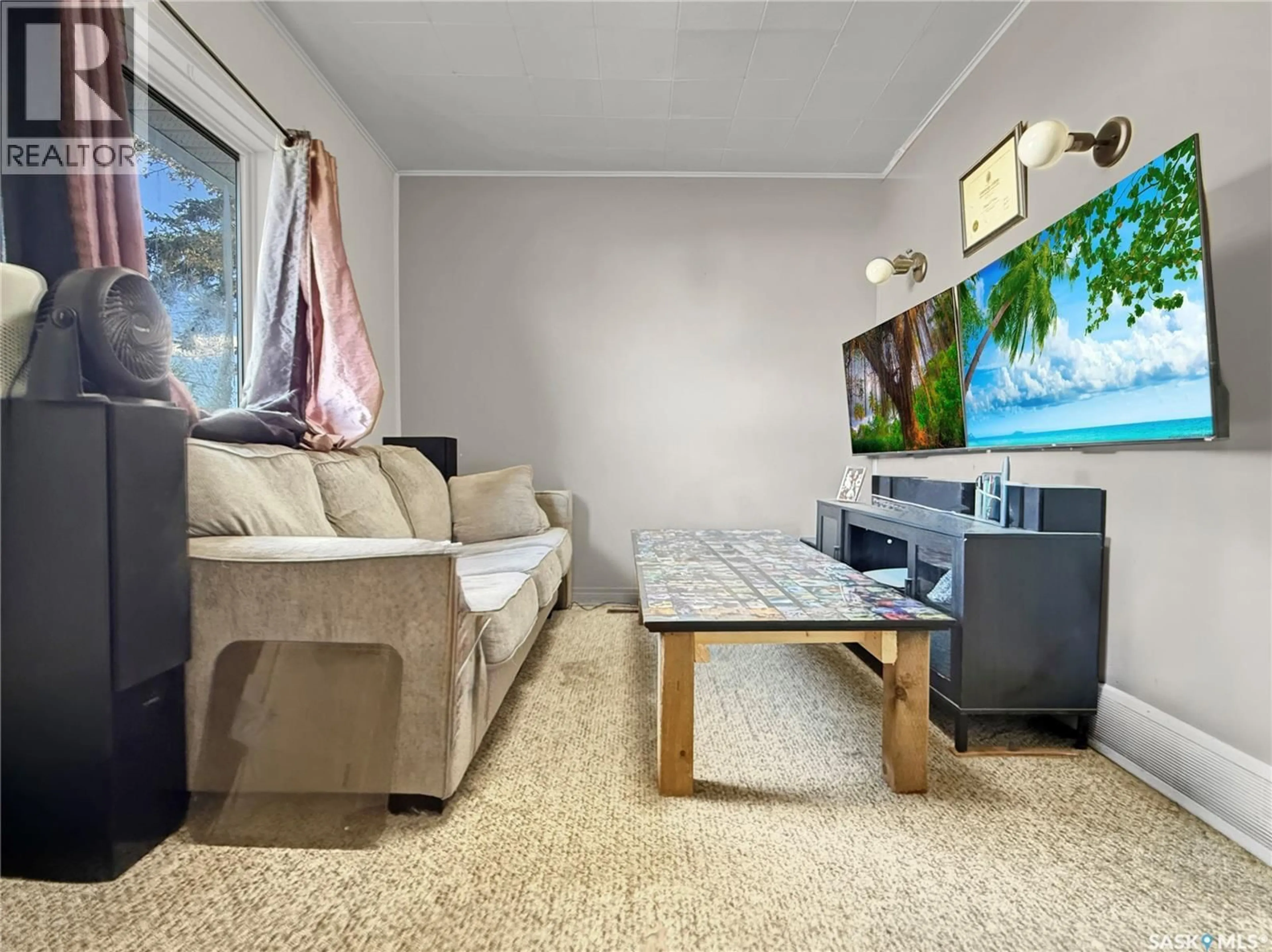Living room with furniture, unknown for 24 14TH AVENUE, Swift Current Saskatchewan S9H3S2