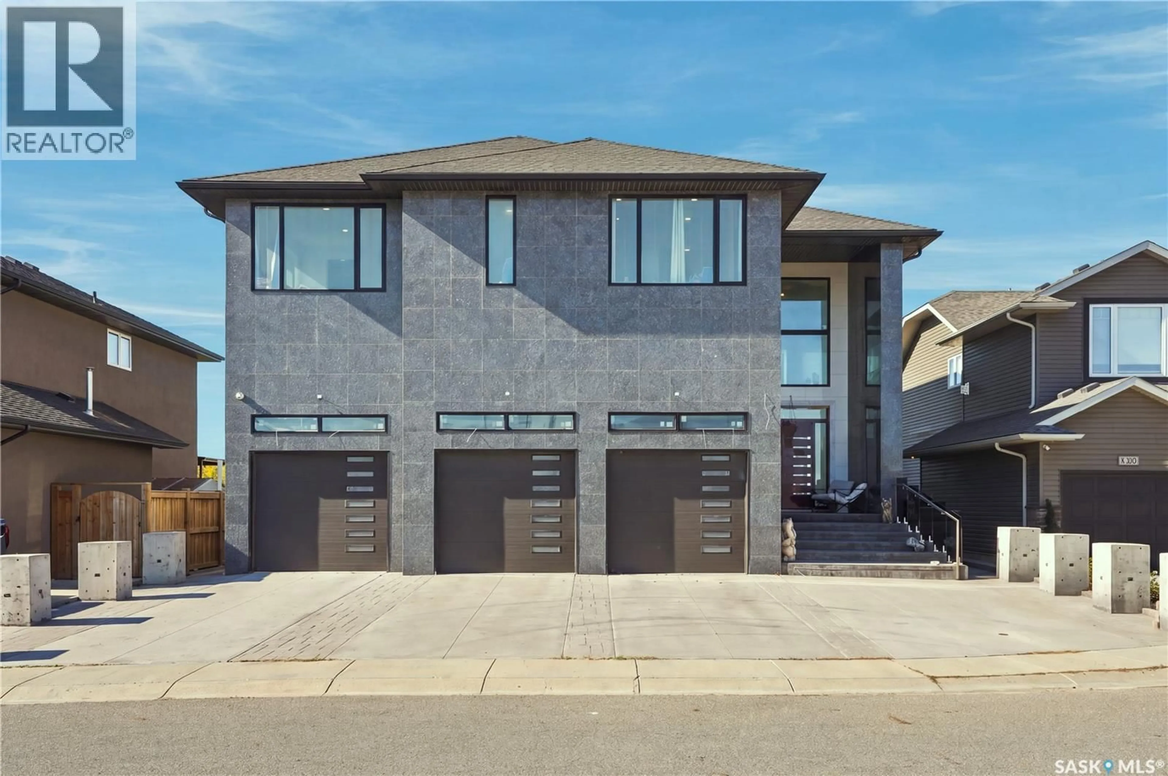 Home with brick exterior material, street for 515 POHORECKY LANE, Saskatoon Saskatchewan S7W0L2