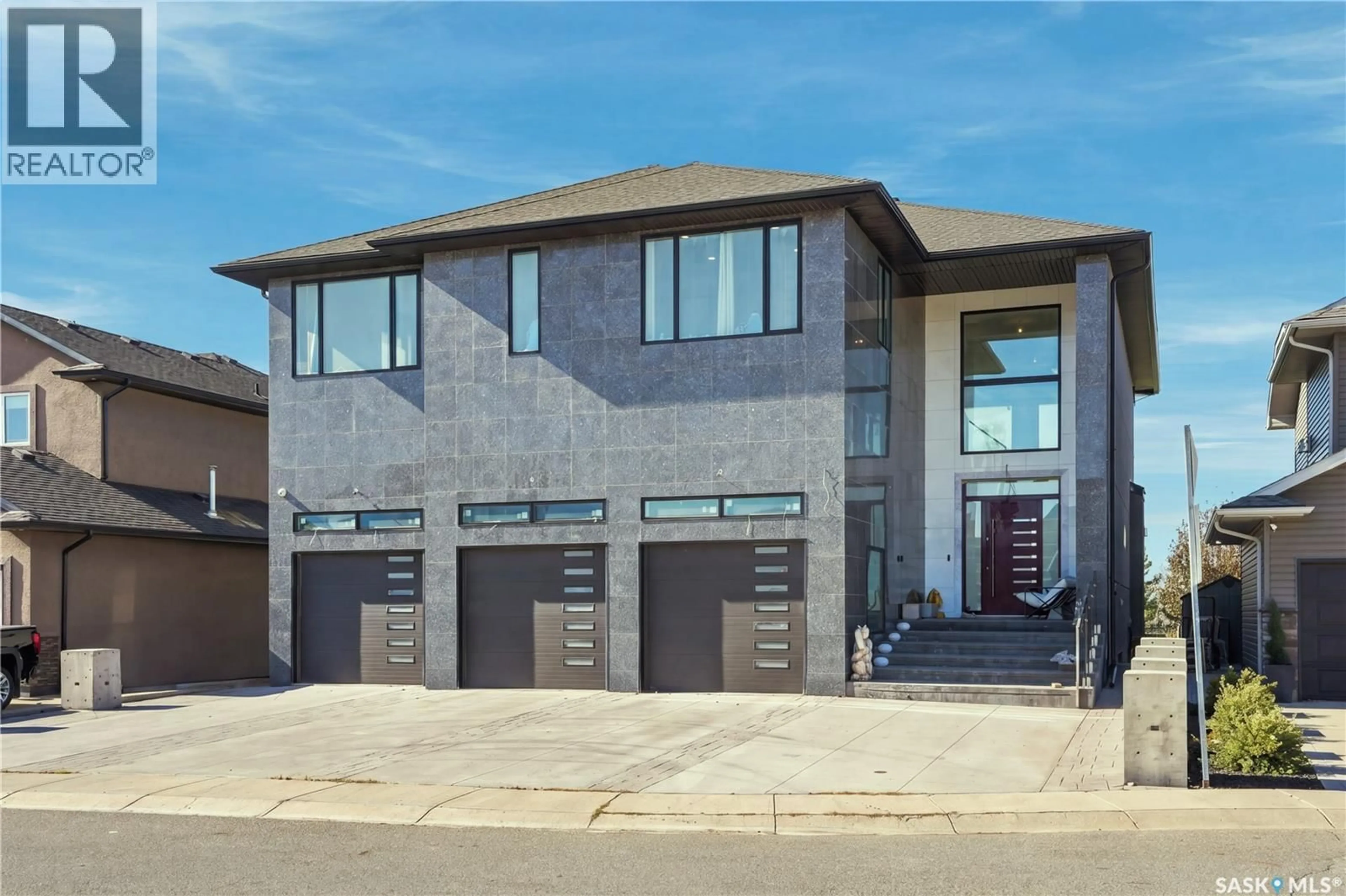Home with brick exterior material, street for 515 POHORECKY LANE, Saskatoon Saskatchewan S7W0L2