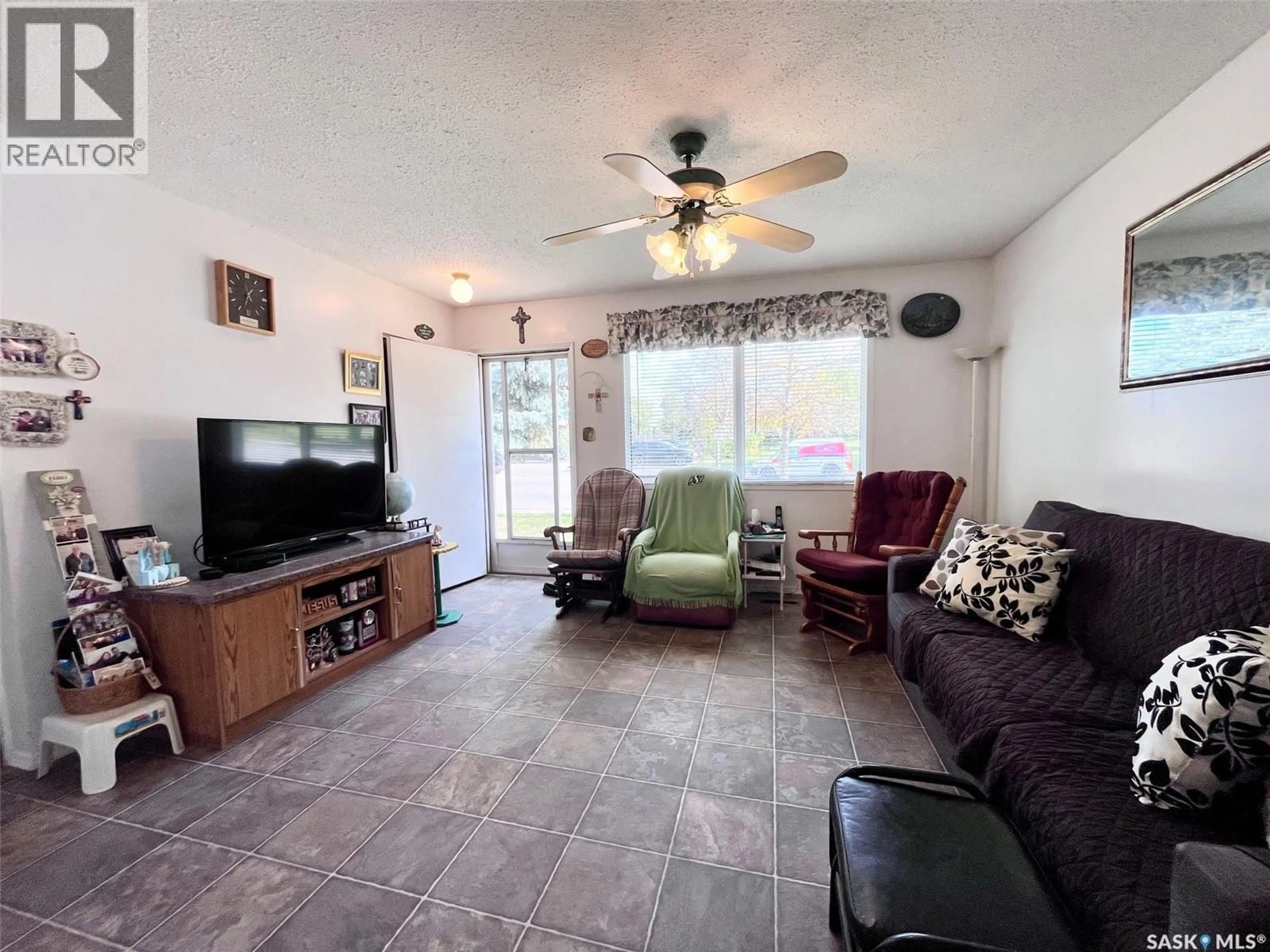 Living room with furniture, unknown for 99 BOWERMAN CRESCENT, Prince Albert Saskatchewan S6V6G3
