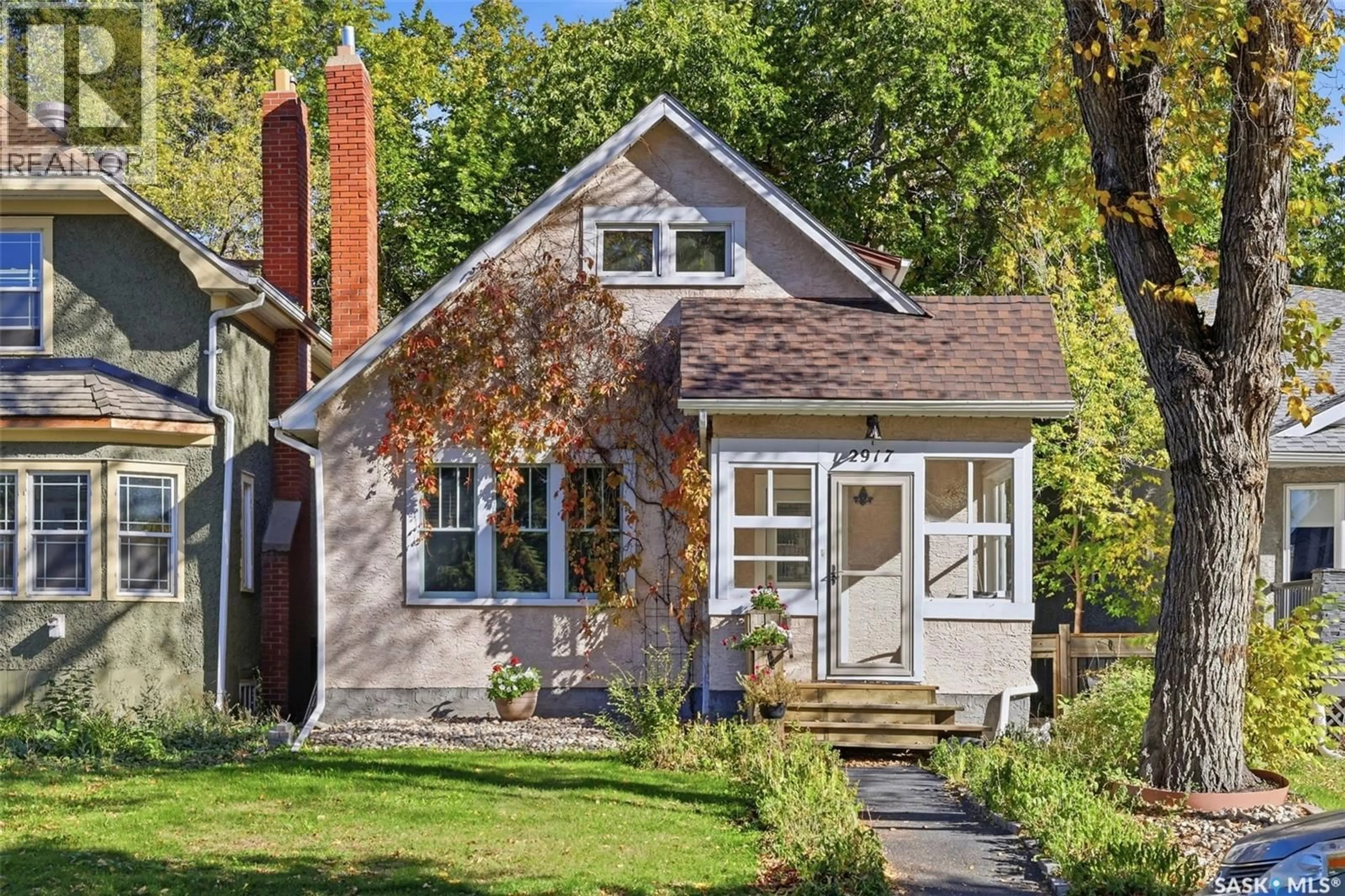 Home with brick exterior material, street for 2917 ROBINSON STREET, Regina Saskatchewan S4S1V2