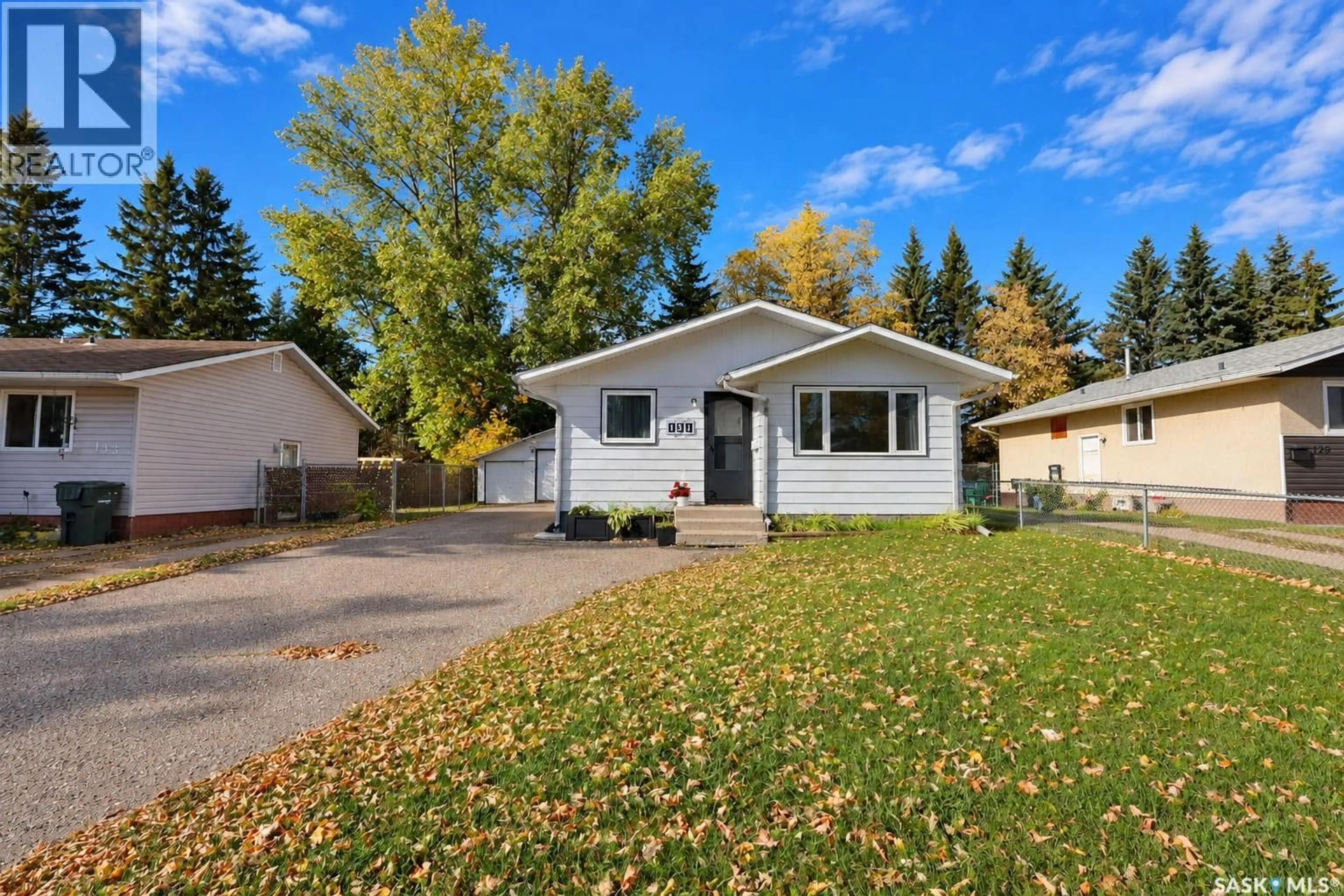 Home with vinyl exterior material, street for 131 MCINTOSH DRIVE, Prince Albert Saskatchewan S6V6H2