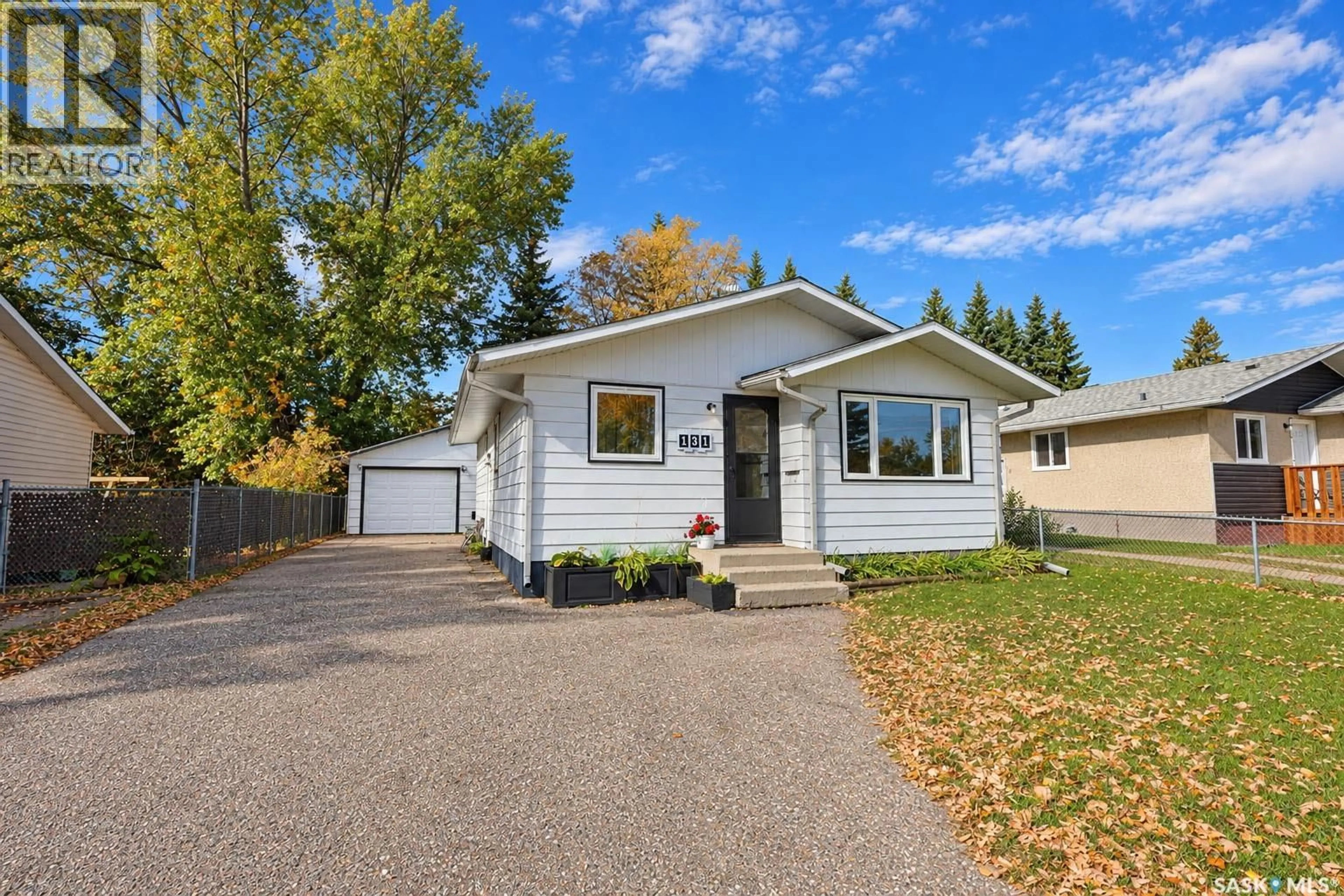 Home with vinyl exterior material, street for 131 MCINTOSH DRIVE, Prince Albert Saskatchewan S6V6H2