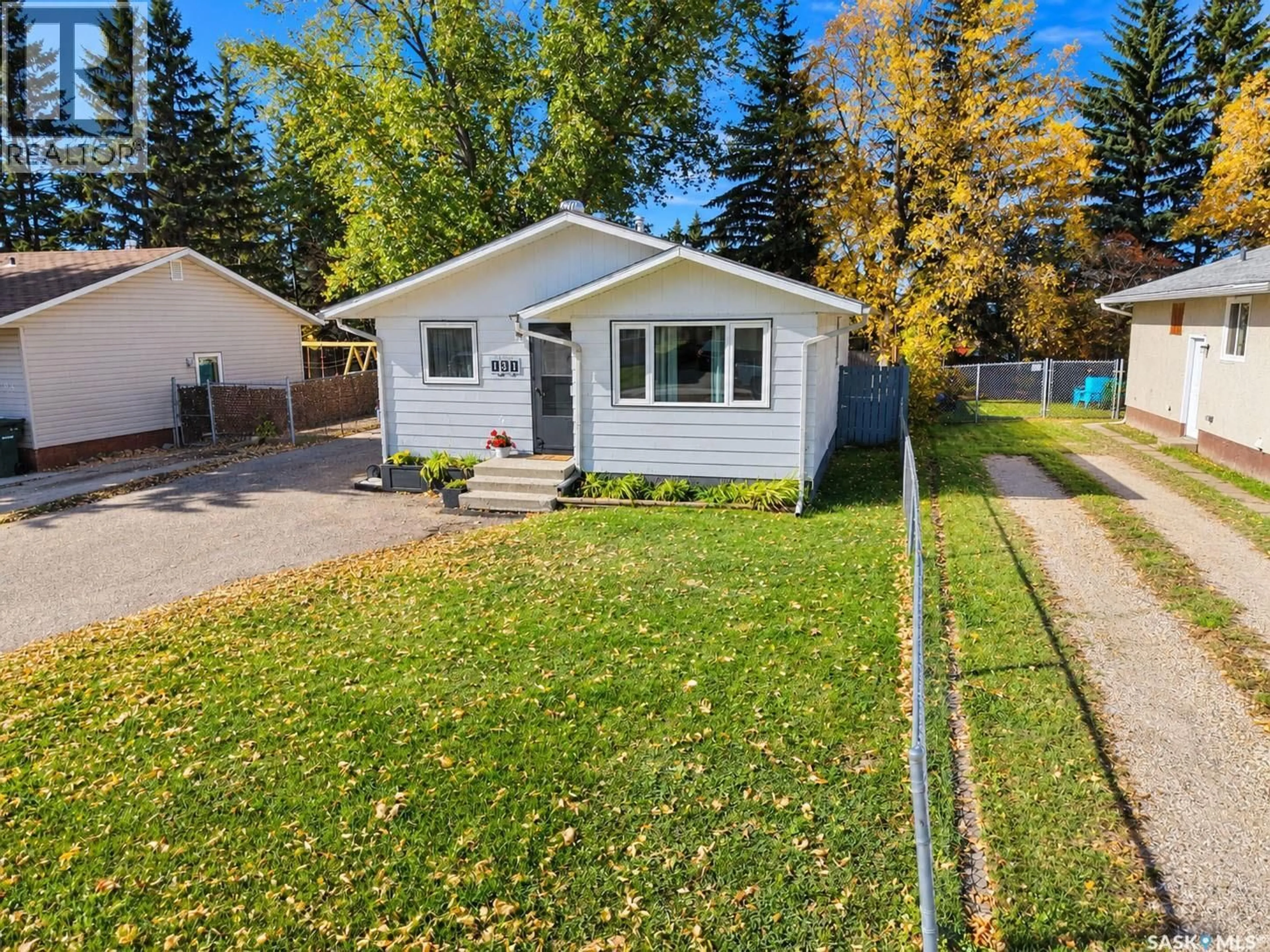 Home with vinyl exterior material, street for 131 MCINTOSH DRIVE, Prince Albert Saskatchewan S6V6H2