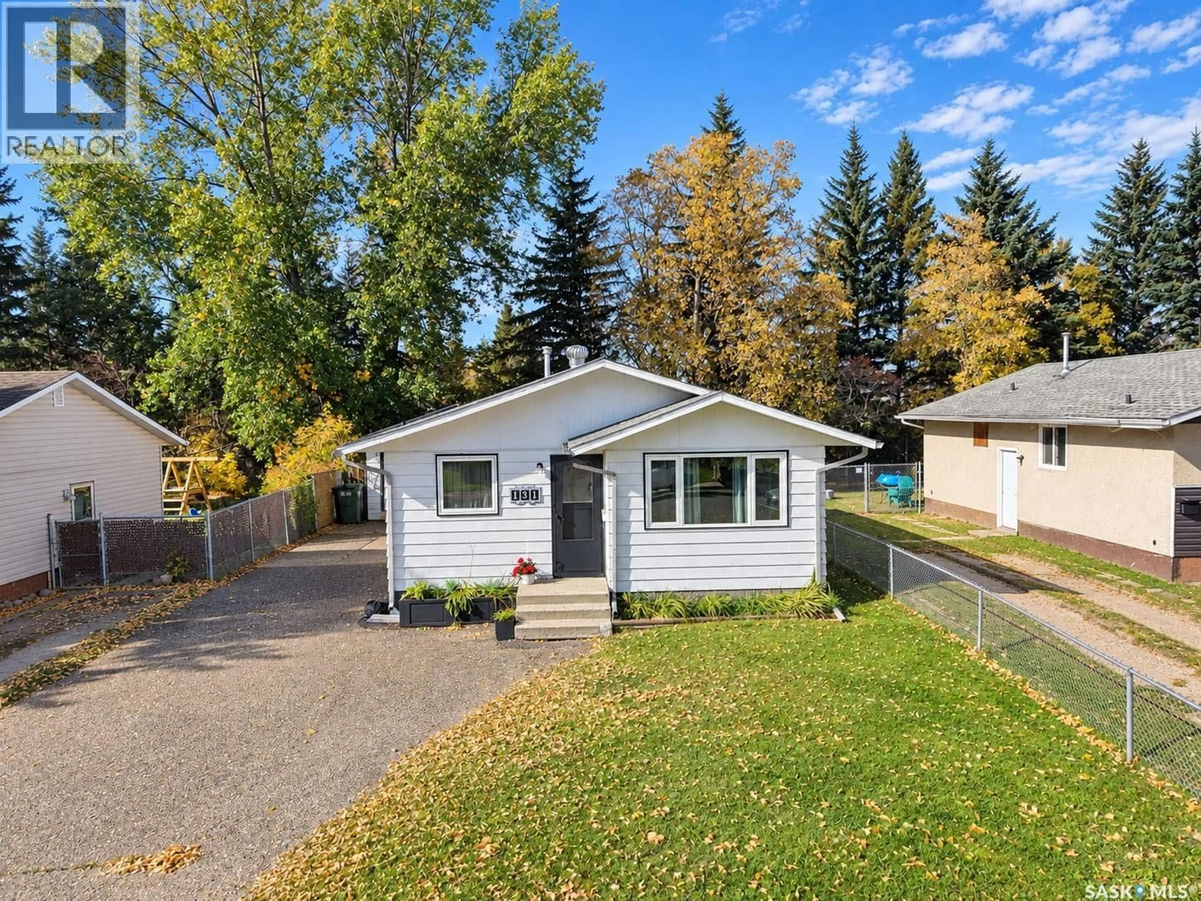 Home with vinyl exterior material, street for 131 MCINTOSH DRIVE, Prince Albert Saskatchewan S6V6H2