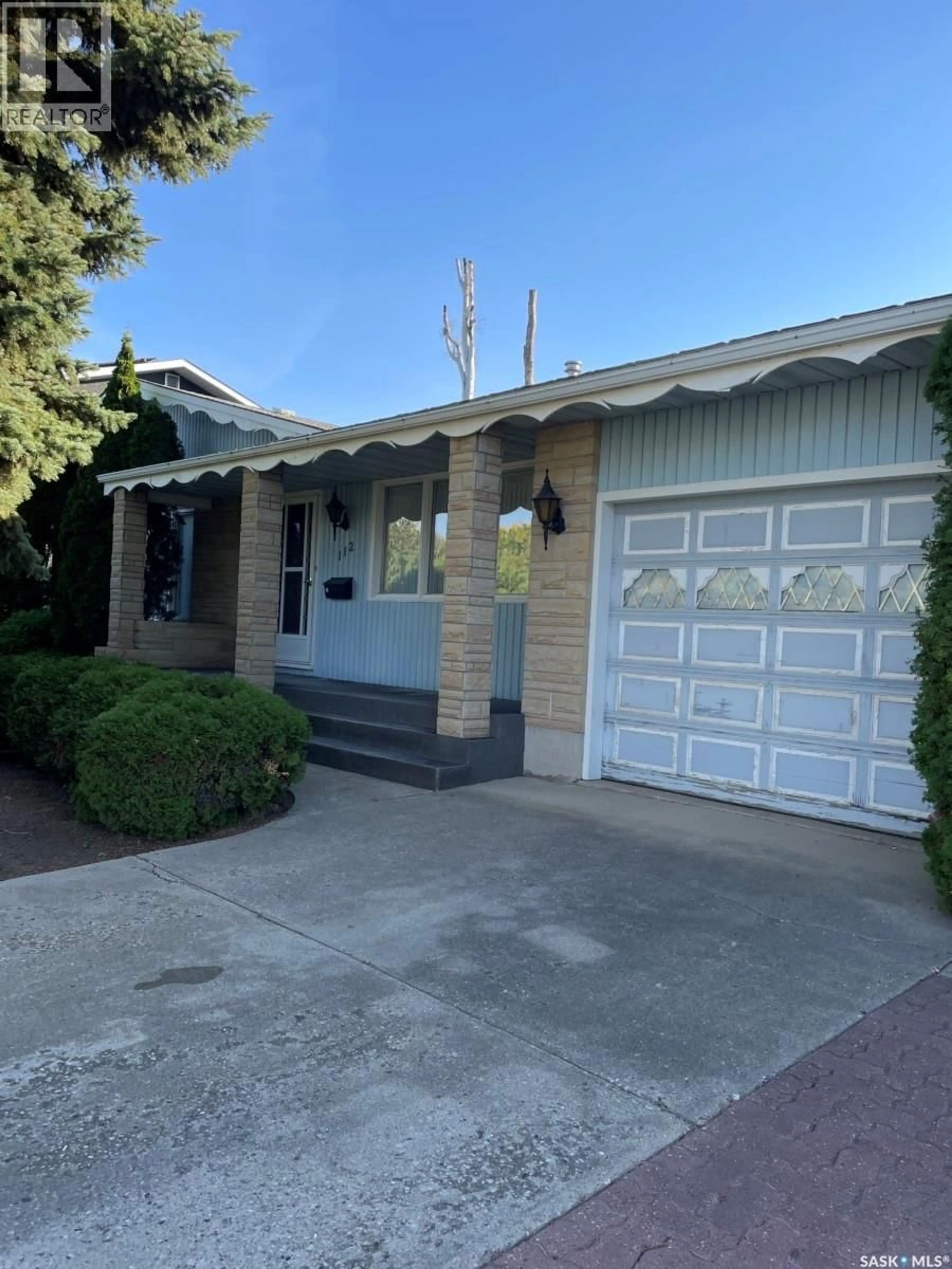 Home with vinyl exterior material, street for 112 DEBORAH CRESCENT, Saskatoon Saskatchewan S7J2W8