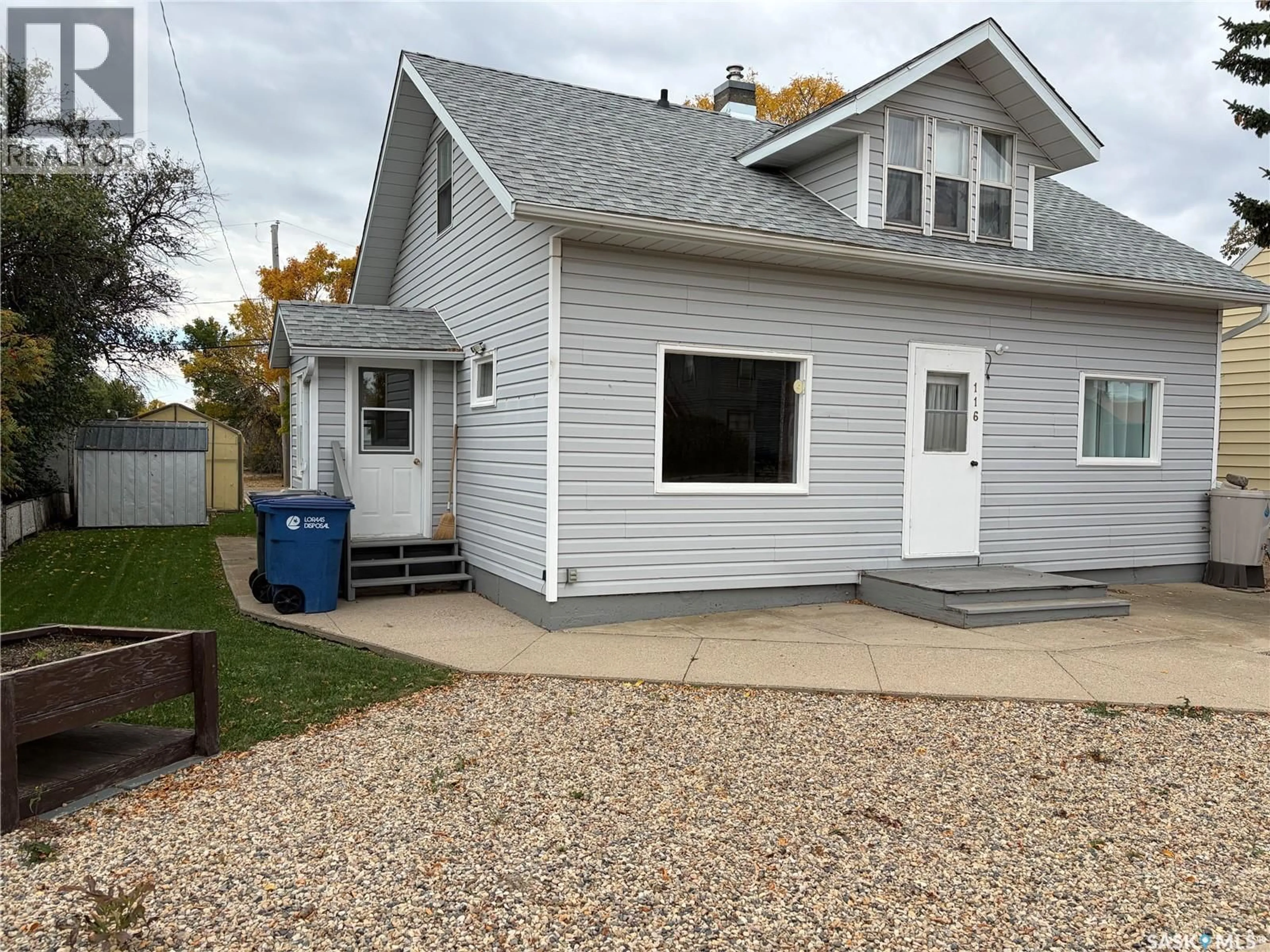 Home with vinyl exterior material, street for 116 5TH AVENUE, Gravelbourg Saskatchewan S0H1X0