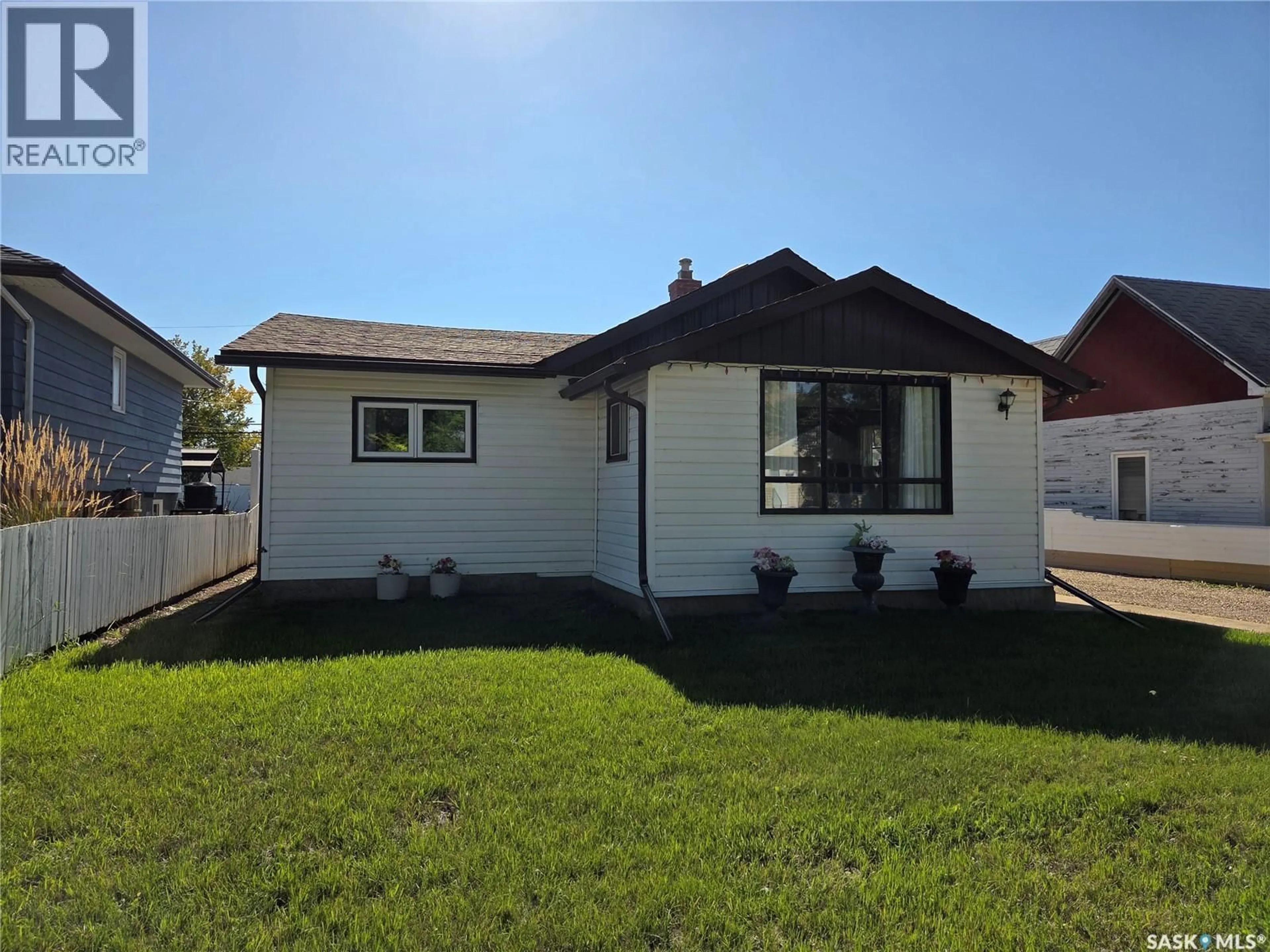 Home with vinyl exterior material, street for 817 STADACONA STREET, Moose Jaw Saskatchewan S6H0K5