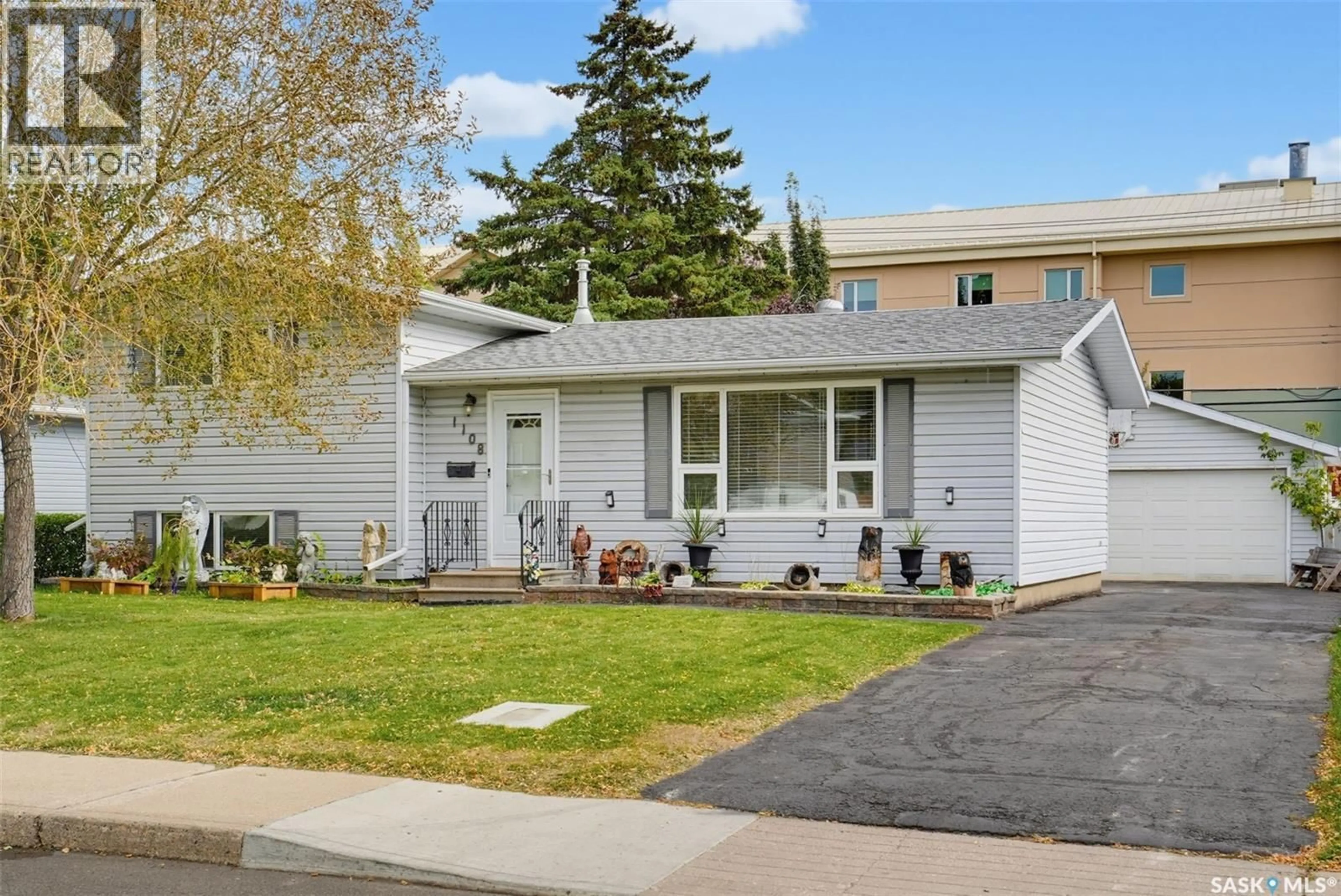 Home with vinyl exterior material, street for 1108 TIFFIN CRESCENT, Saskatoon Saskatchewan S7L3R3