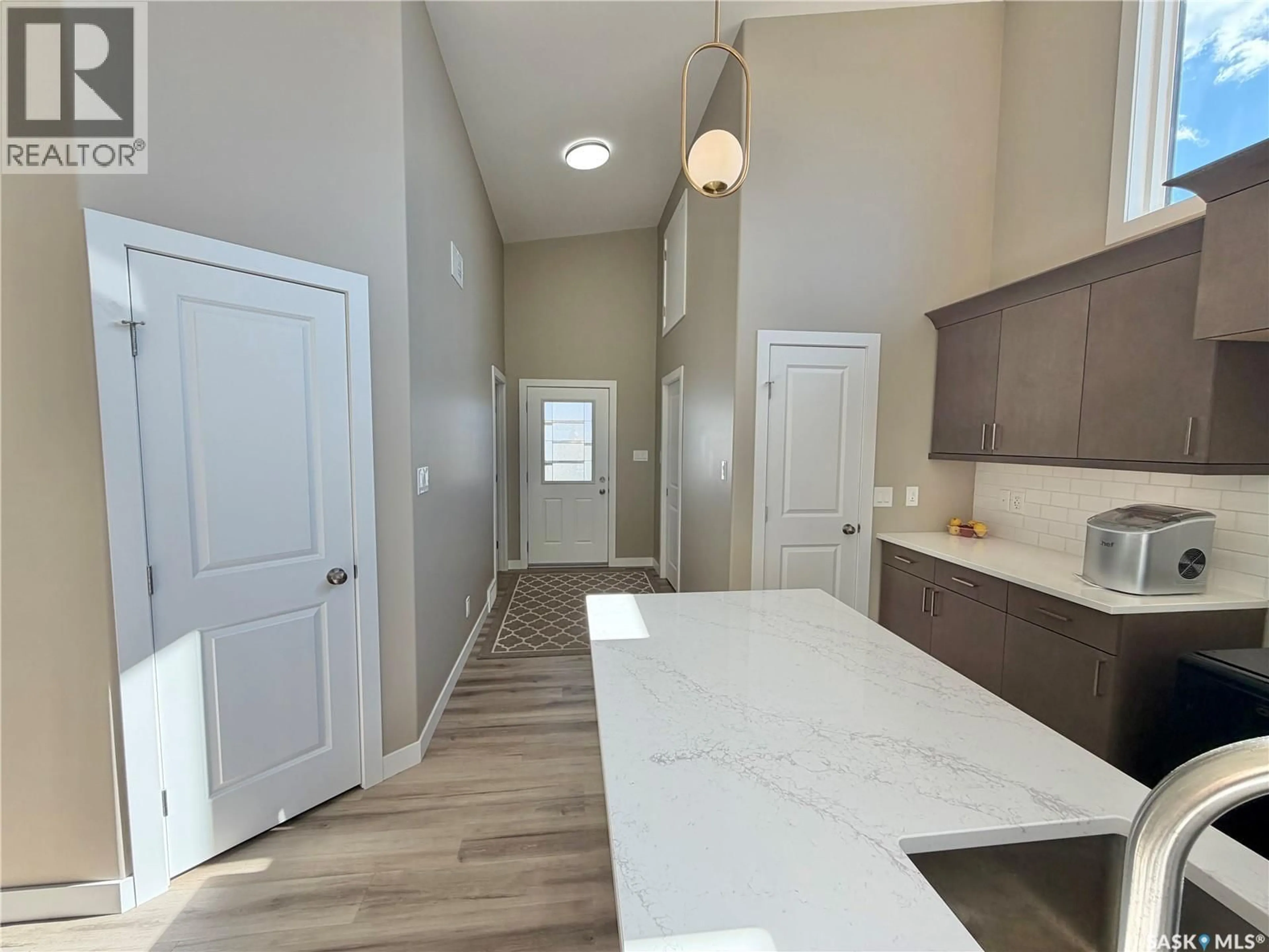 Open concept kitchen, ceramic/tile floor for 1119 BIRCHWOOD AVENUE, Good Spirit Lake Saskatchewan S0A0L0