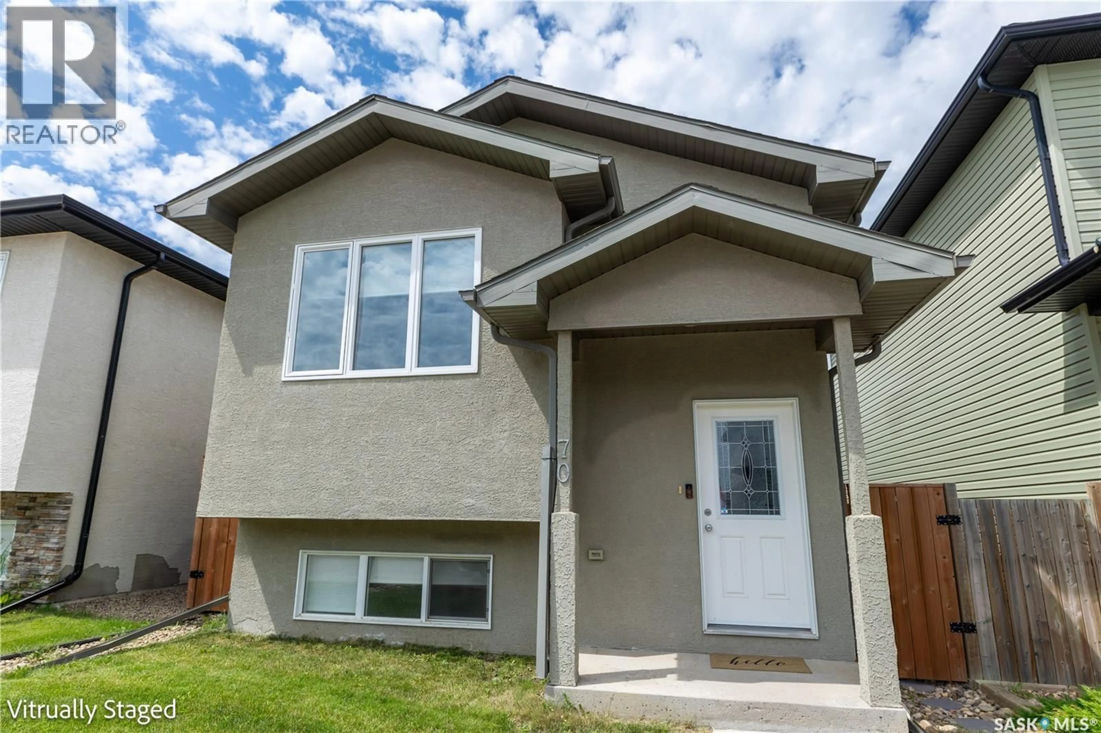 Home with vinyl exterior material, street for 70 BRIGHAM ROAD, Moose Jaw Saskatchewan S6K0A7