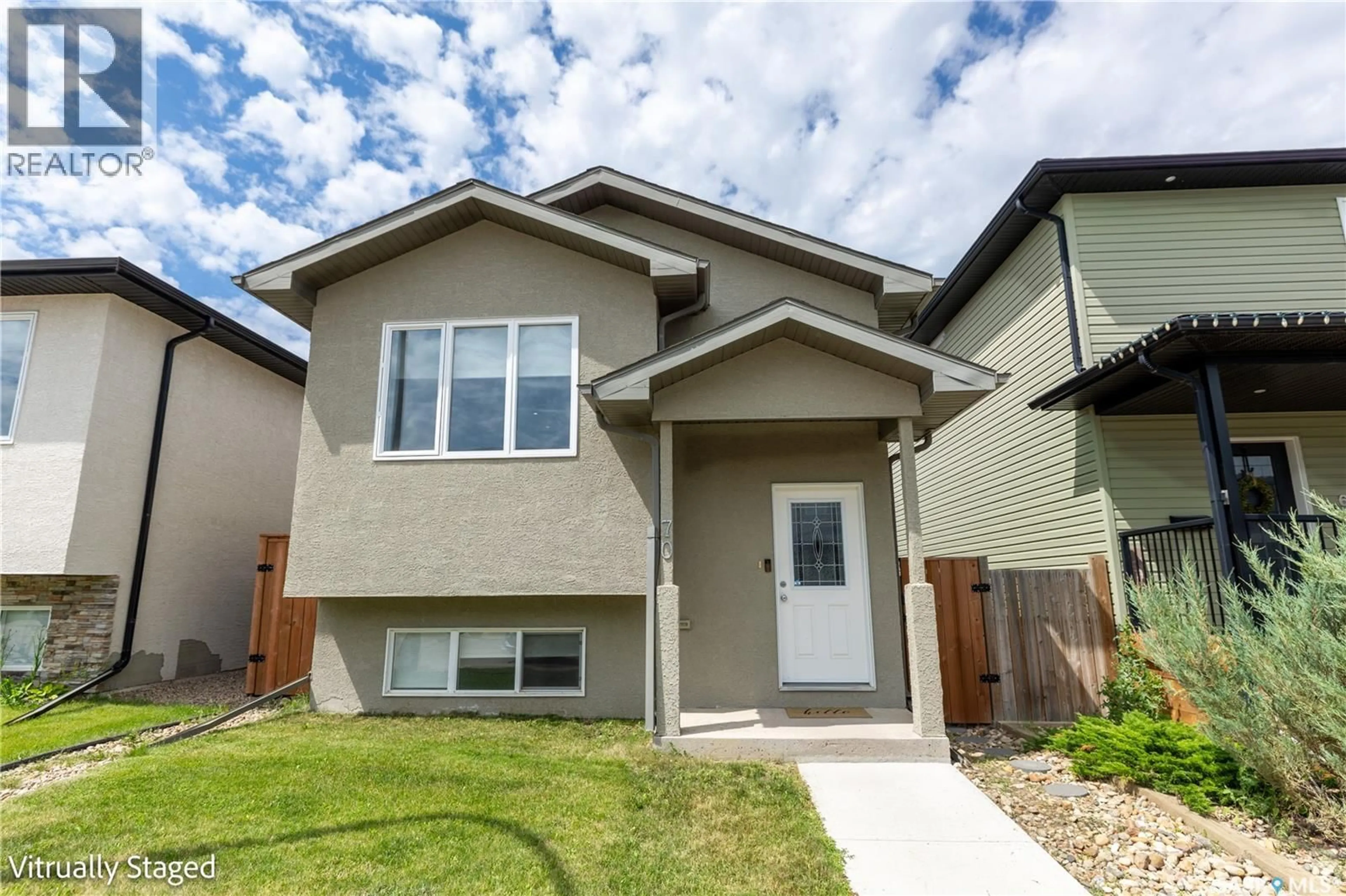 Home with vinyl exterior material, street for 70 BRIGHAM ROAD, Moose Jaw Saskatchewan S6K0A7
