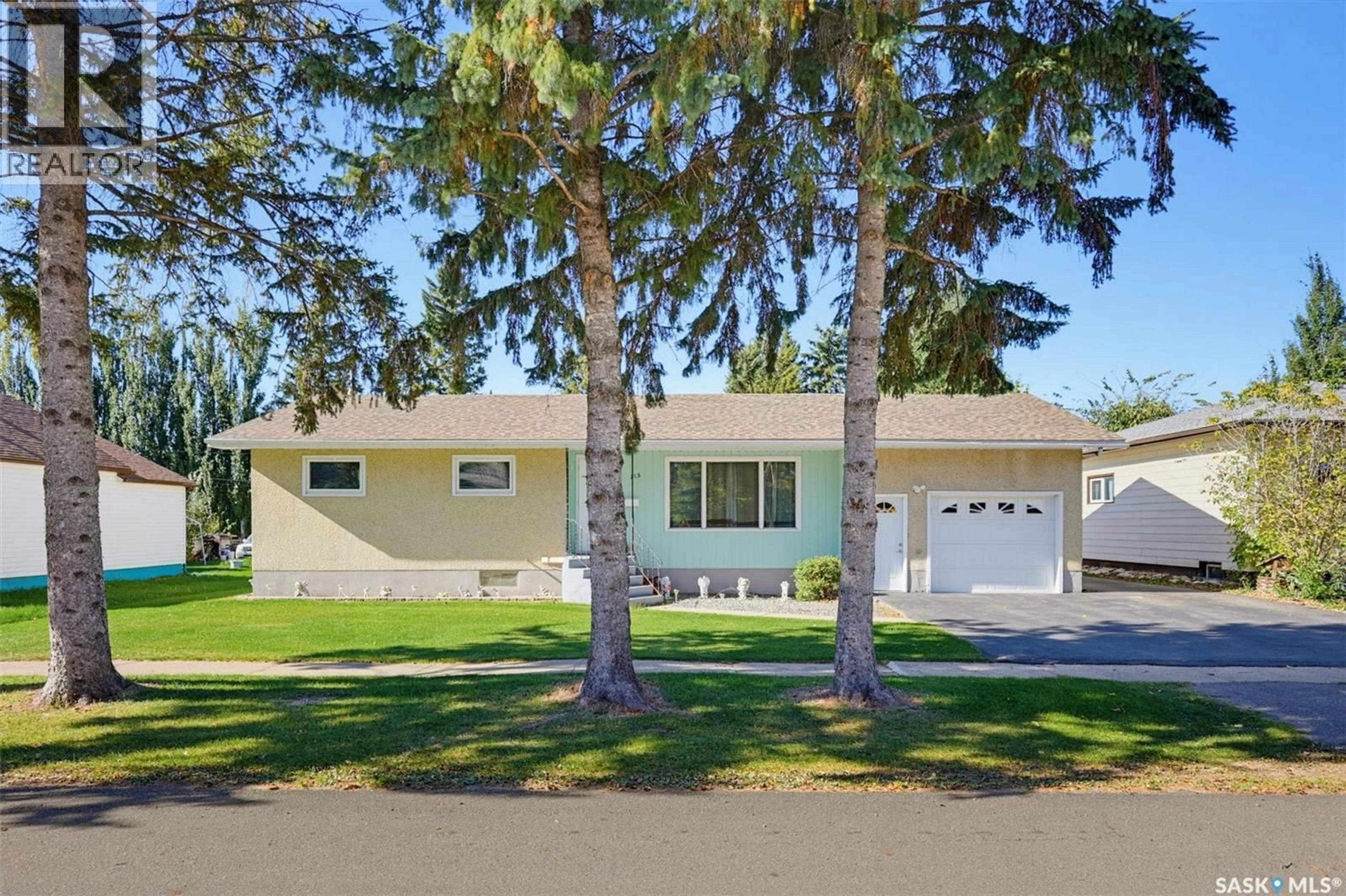 Home with vinyl exterior material, street for 313 4TH AVENUE, Cudworth Saskatchewan S0K1B0