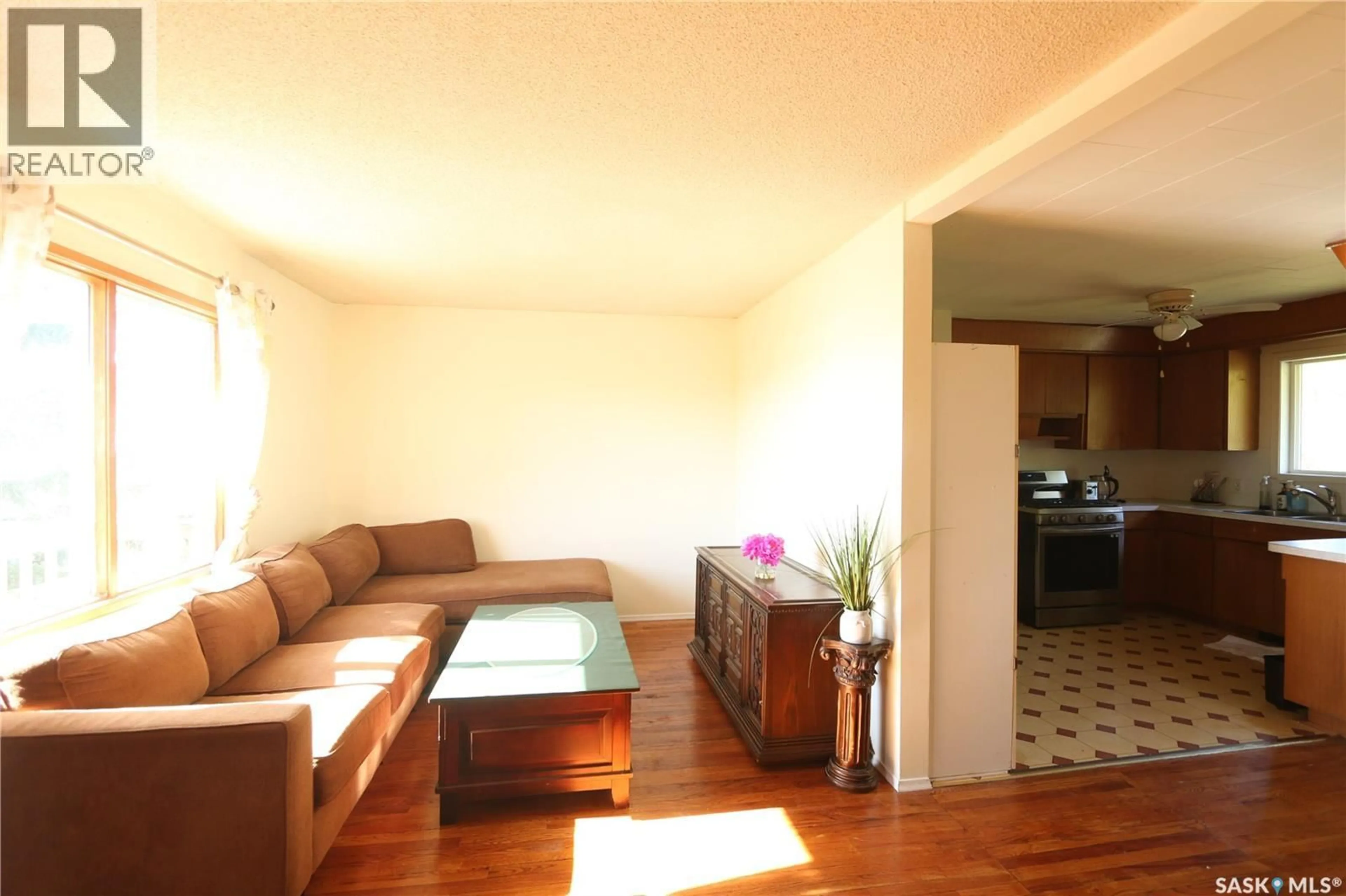 Living room with furniture, wood/laminate floor for 675 FORT SAN ROAD, Fort San Saskatchewan S0G1S0