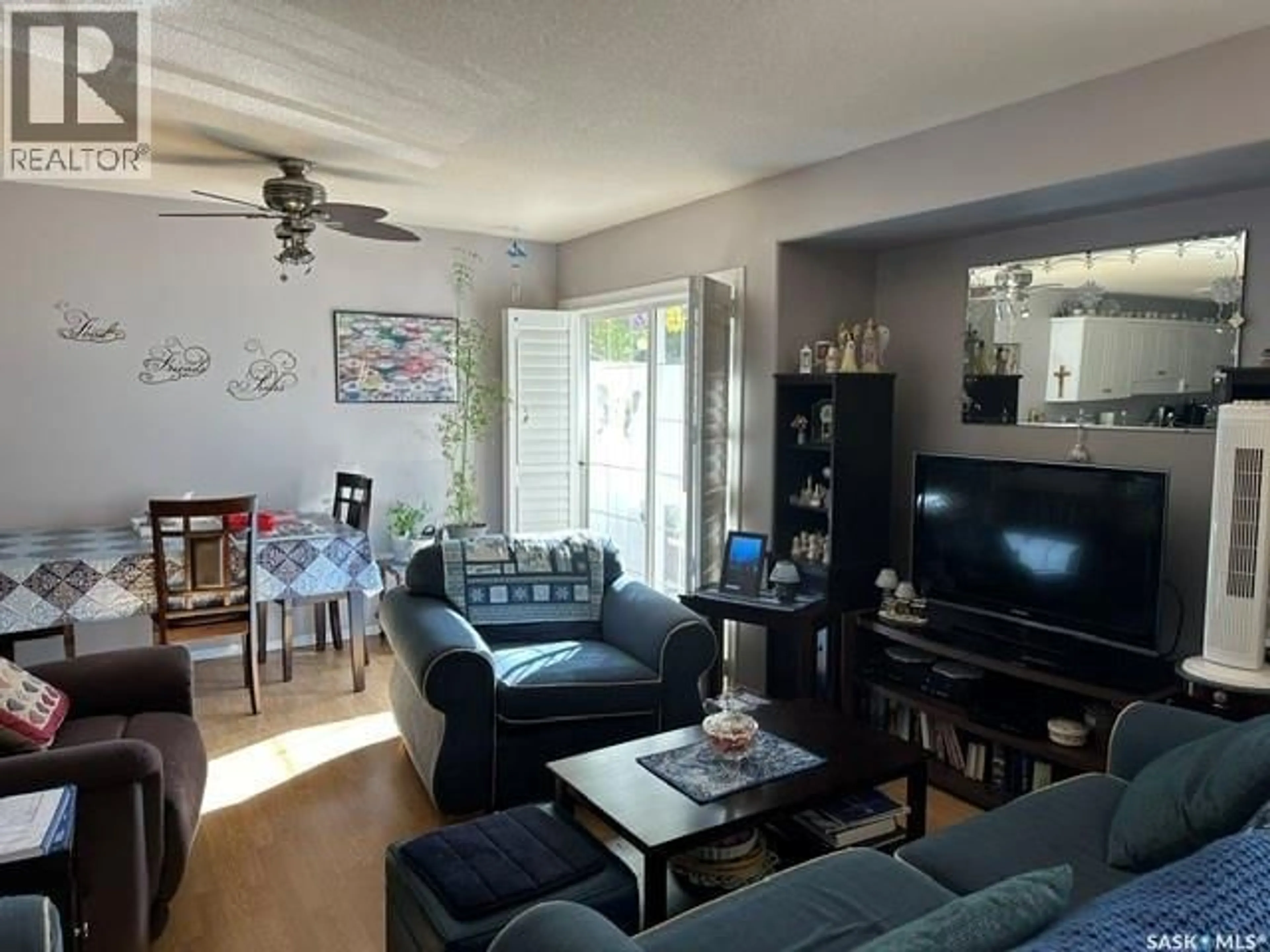 Living room with furniture, unknown for 5440 ROCHDALE BOULEVARD, Regina Saskatchewan S4X4P1