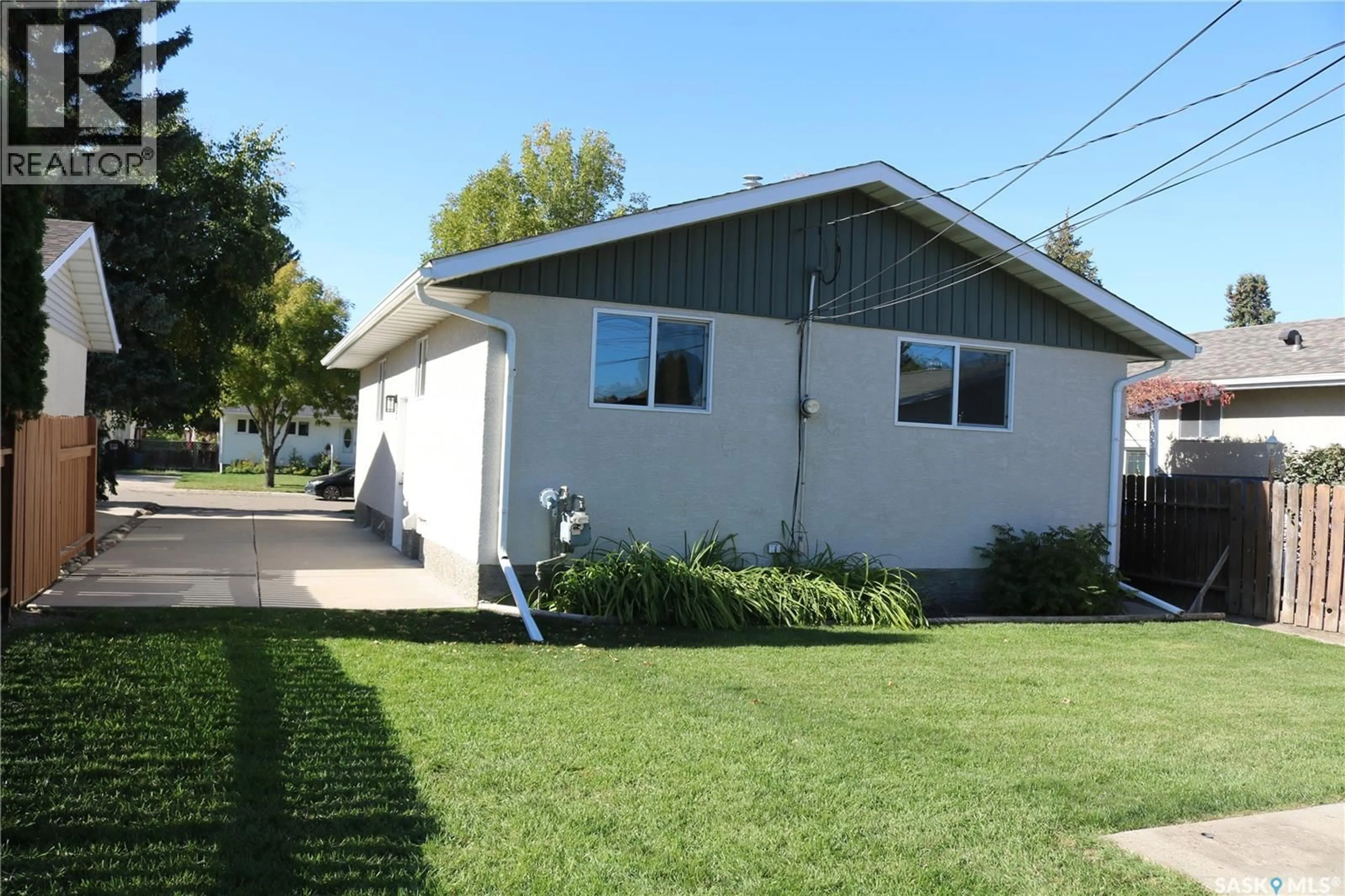 Home with vinyl exterior material, street for 1641 THOMPSON AVENUE, Saskatoon Saskatchewan S7N1Y2