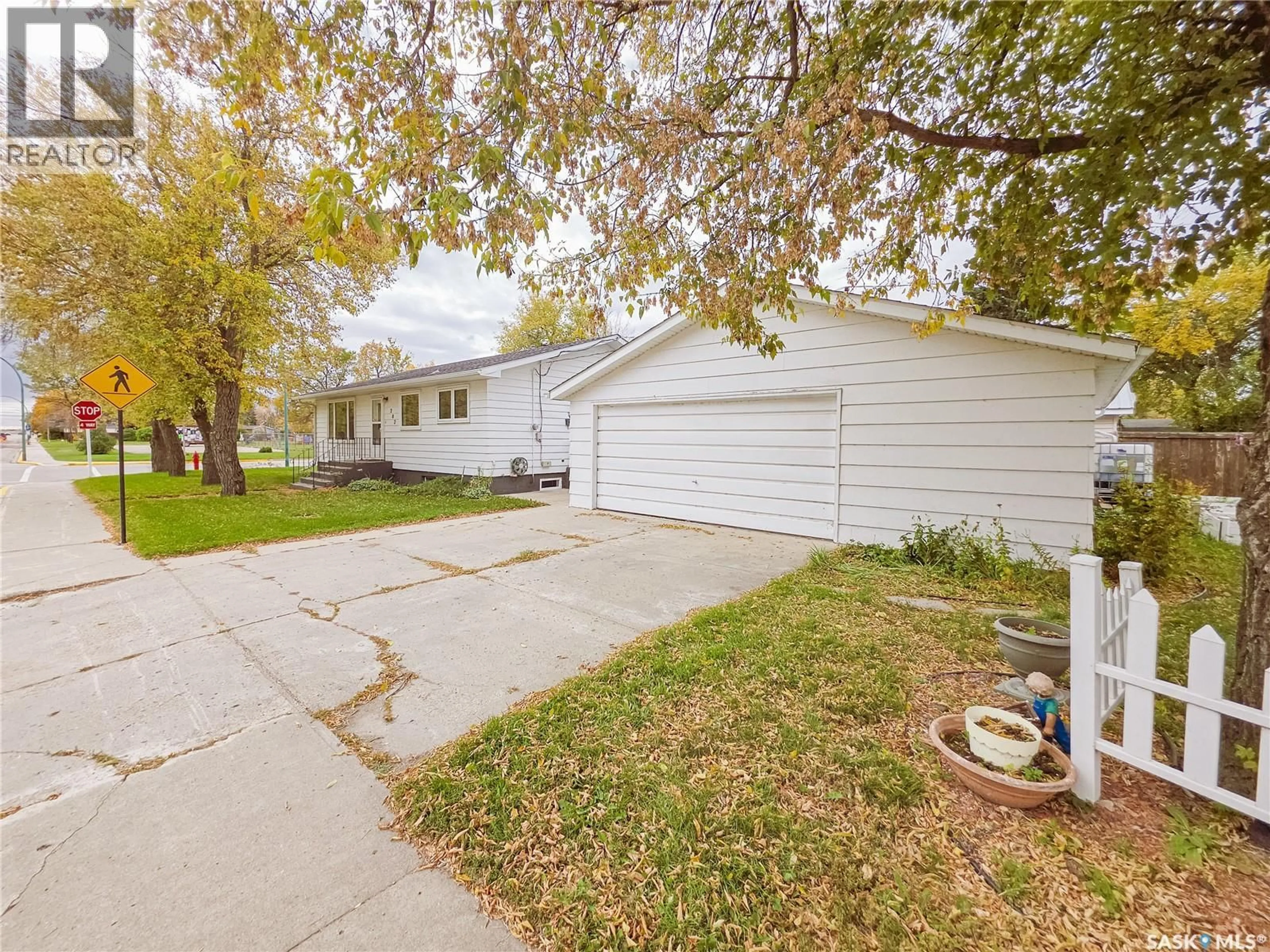 A pic from outside/outdoor area/front of a property/back of a property/a pic from drone, street for 202 7TH AVENUE, Melville Saskatchewan S0A2P0