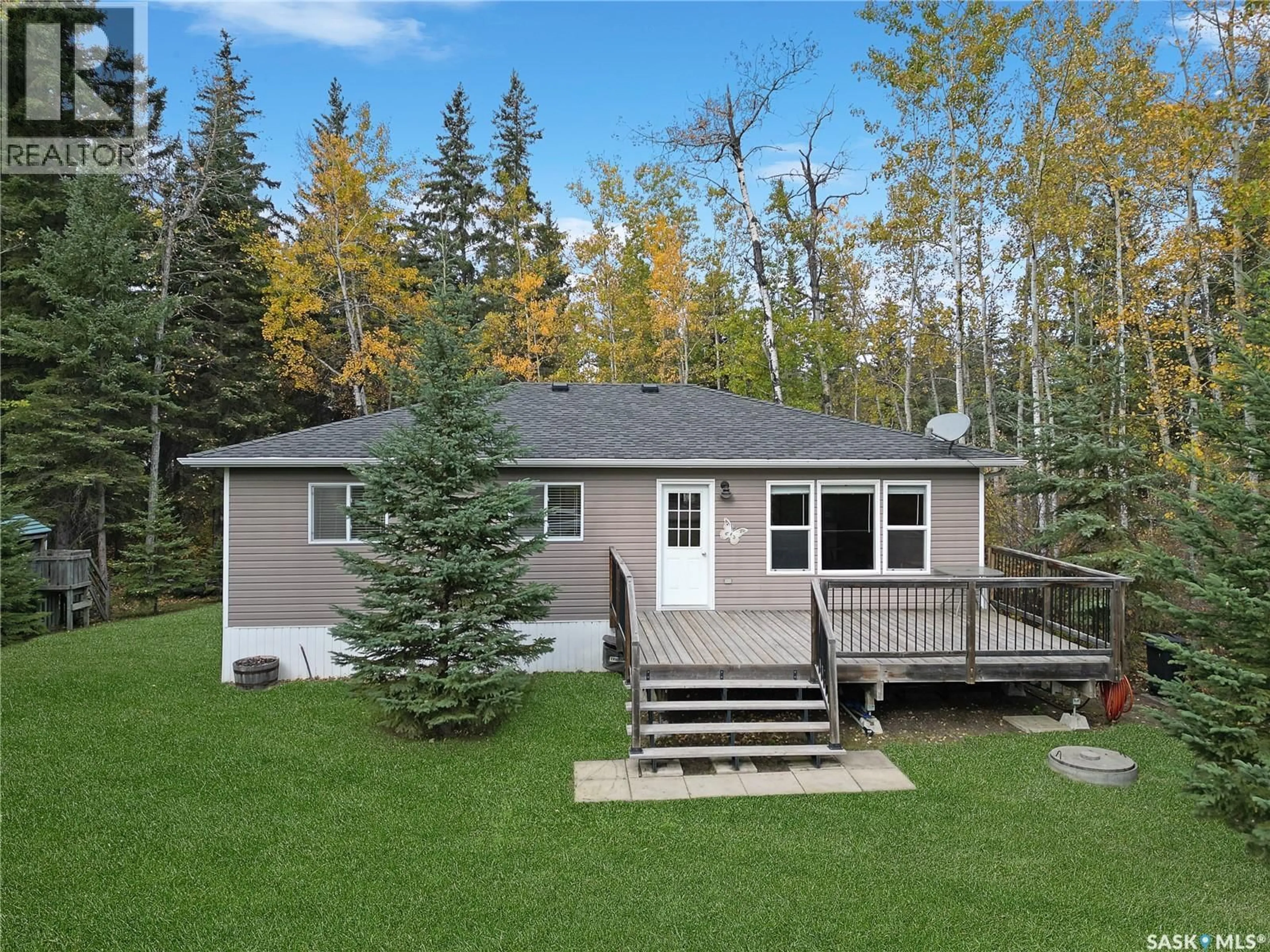 Home with vinyl exterior material, forest/trees view for 1032 ASPEN COVE, Turtle View Saskatchewan S0M1J0