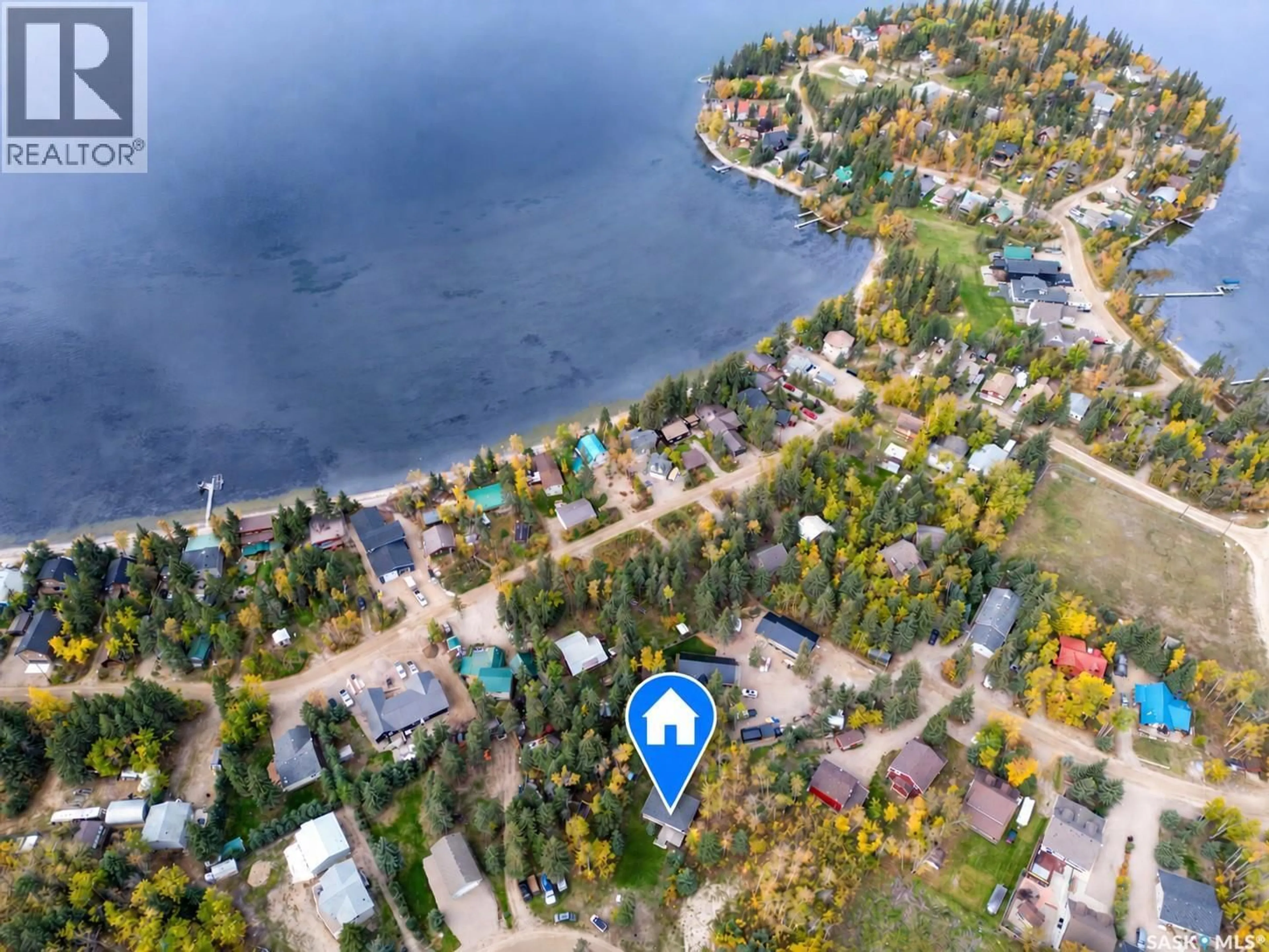 A pic from outside/outdoor area/front of a property/back of a property/a pic from drone, water/lake/river/ocean view for 1032 ASPEN COVE, Turtle View Saskatchewan S0M1J0