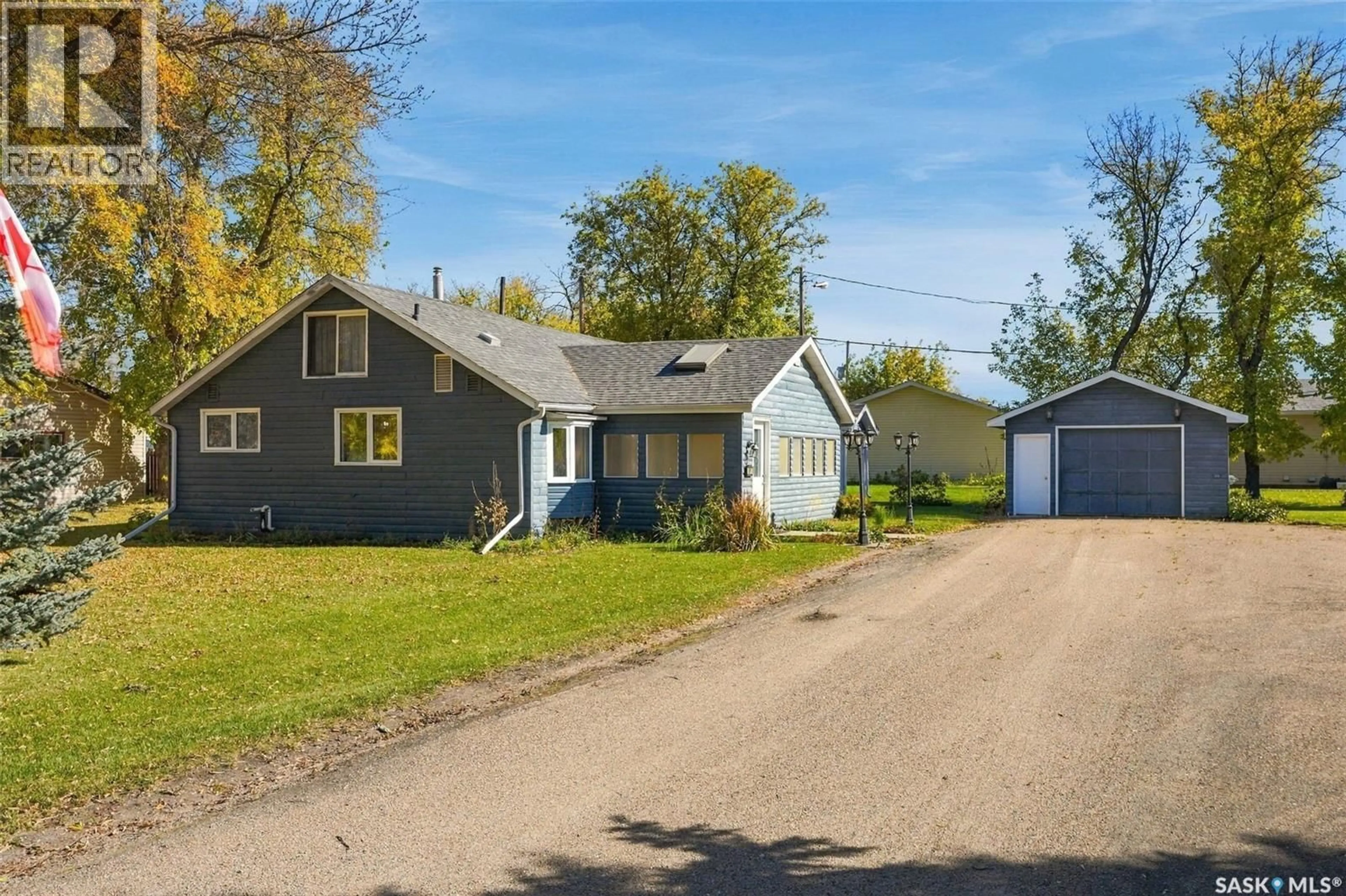 A pic from outside/outdoor area/front of a property/back of a property/a pic from drone, street for 308 2ND STREET, Leask Saskatchewan S0J1M0