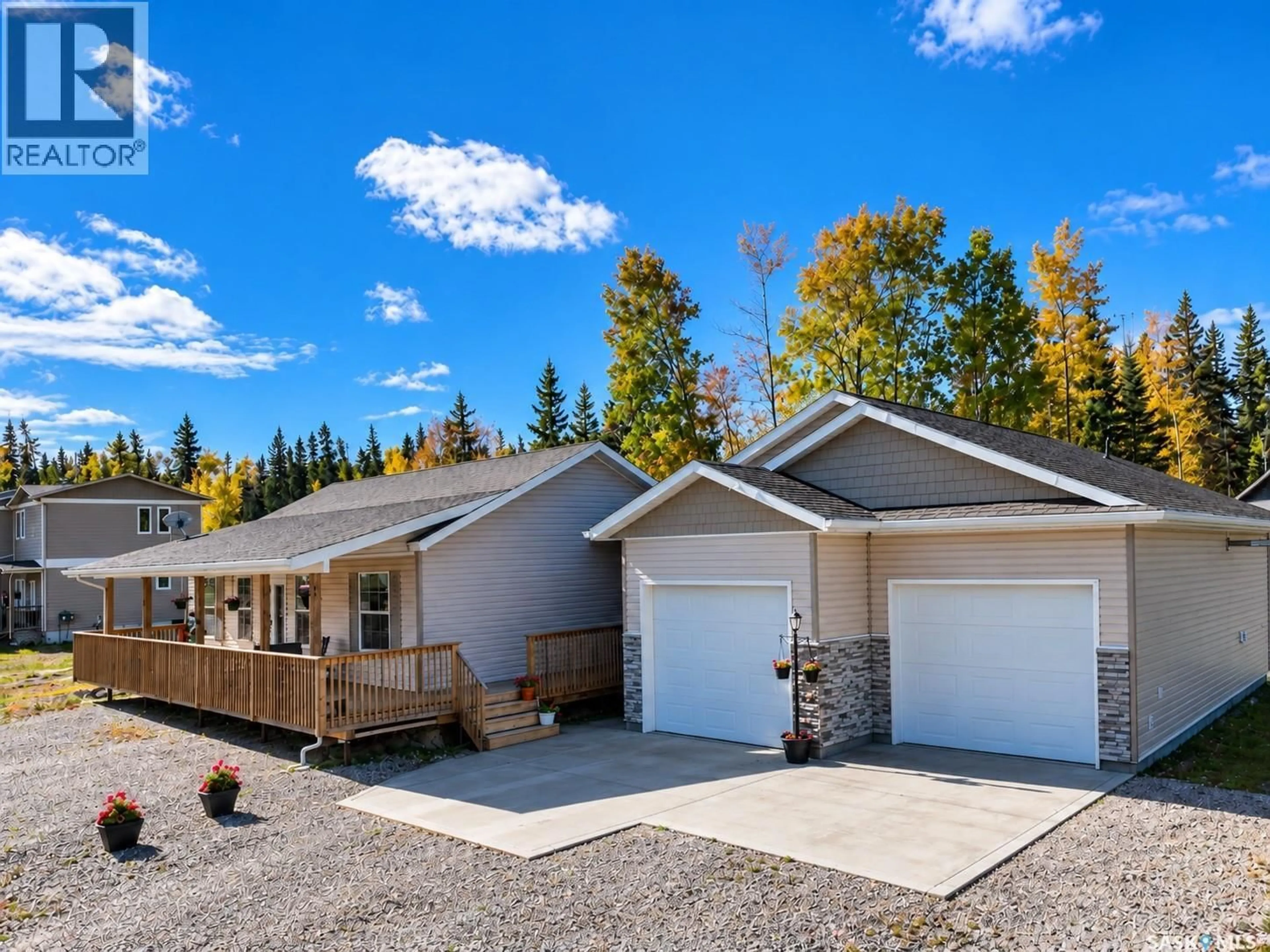 Home with vinyl exterior material, street for 20 RUMBERGER ROAD, Candle Lake Saskatchewan S0J3E0
