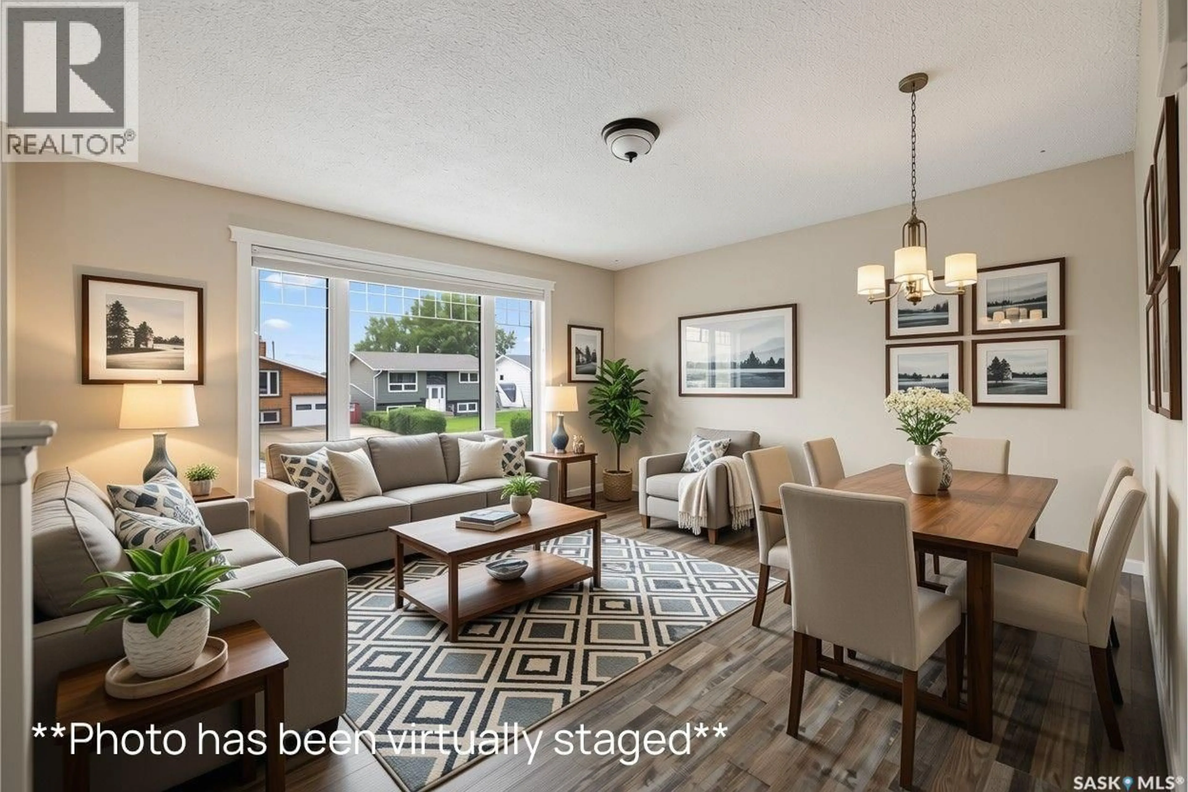 Living room with furniture, wood/laminate floor for 1538 SPADINA STREET, Moose Jaw Saskatchewan S6H7E6