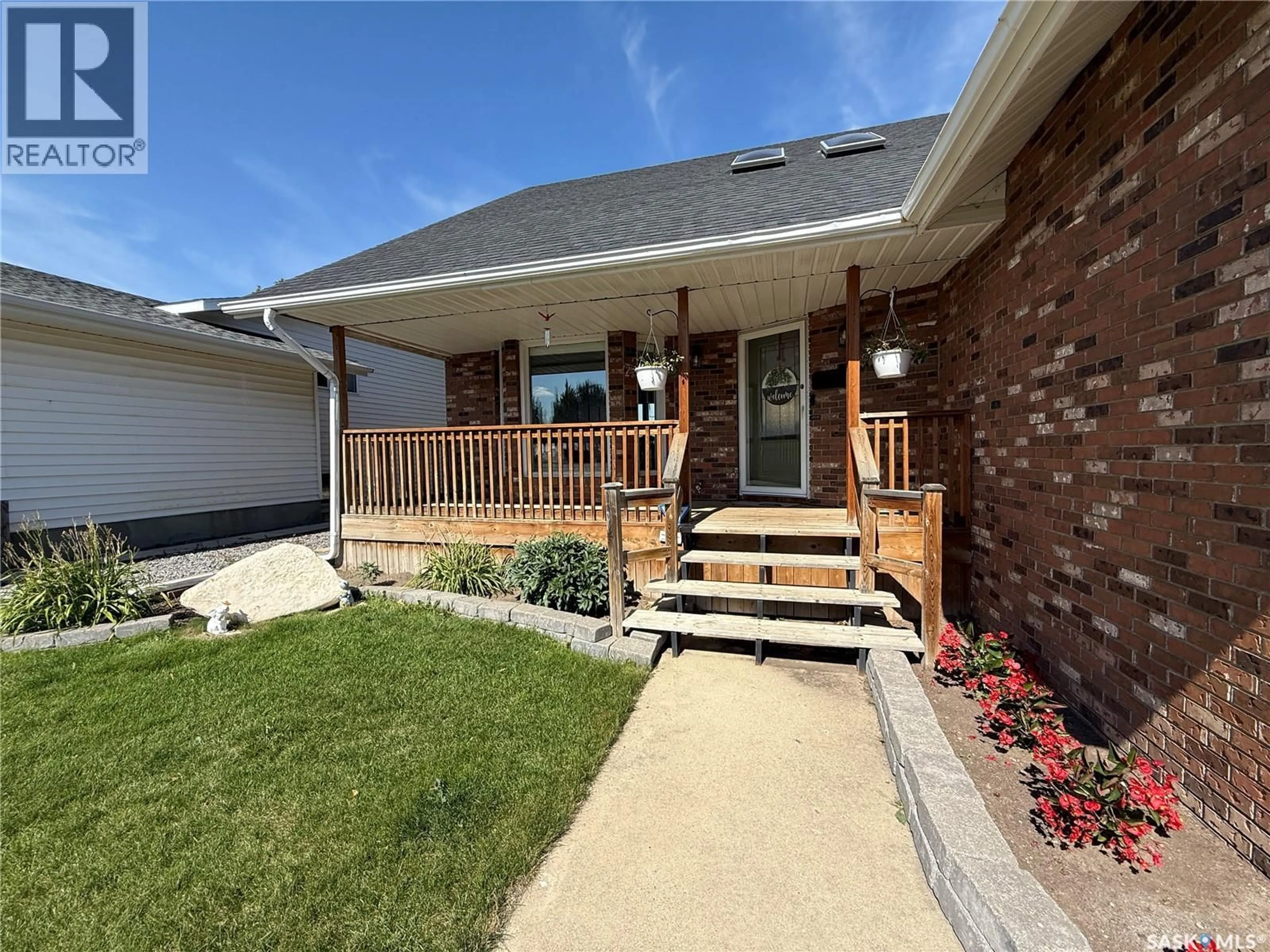 Home with brick exterior material, street for 2523 CARDINAL CRESCENT, North Battleford Saskatchewan S9A3X1