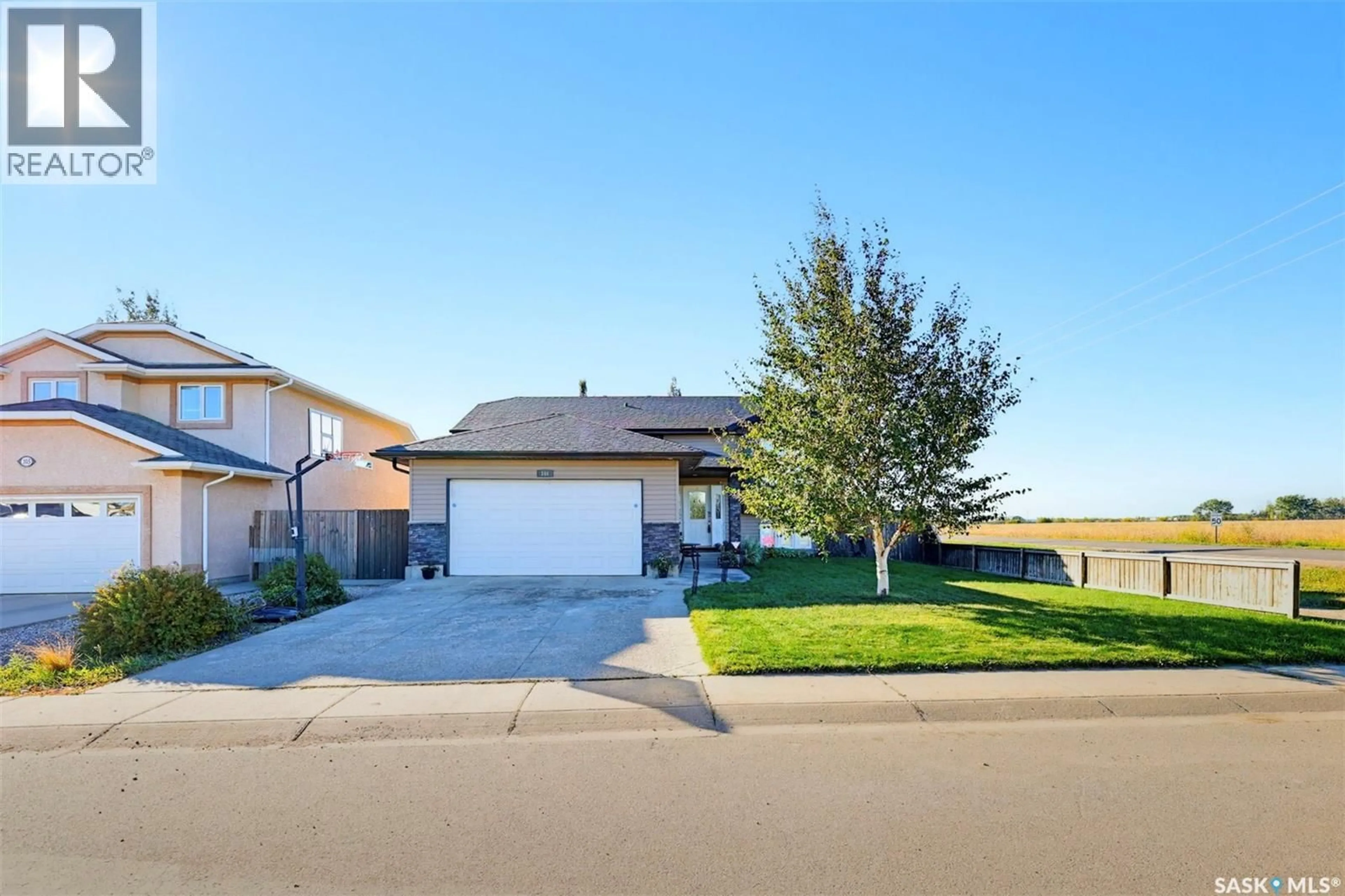 A pic from outside/outdoor area/front of a property/back of a property/a pic from drone, street for 101 LAKERIDGE DRIVE, Warman Saskatchewan S0K0A1