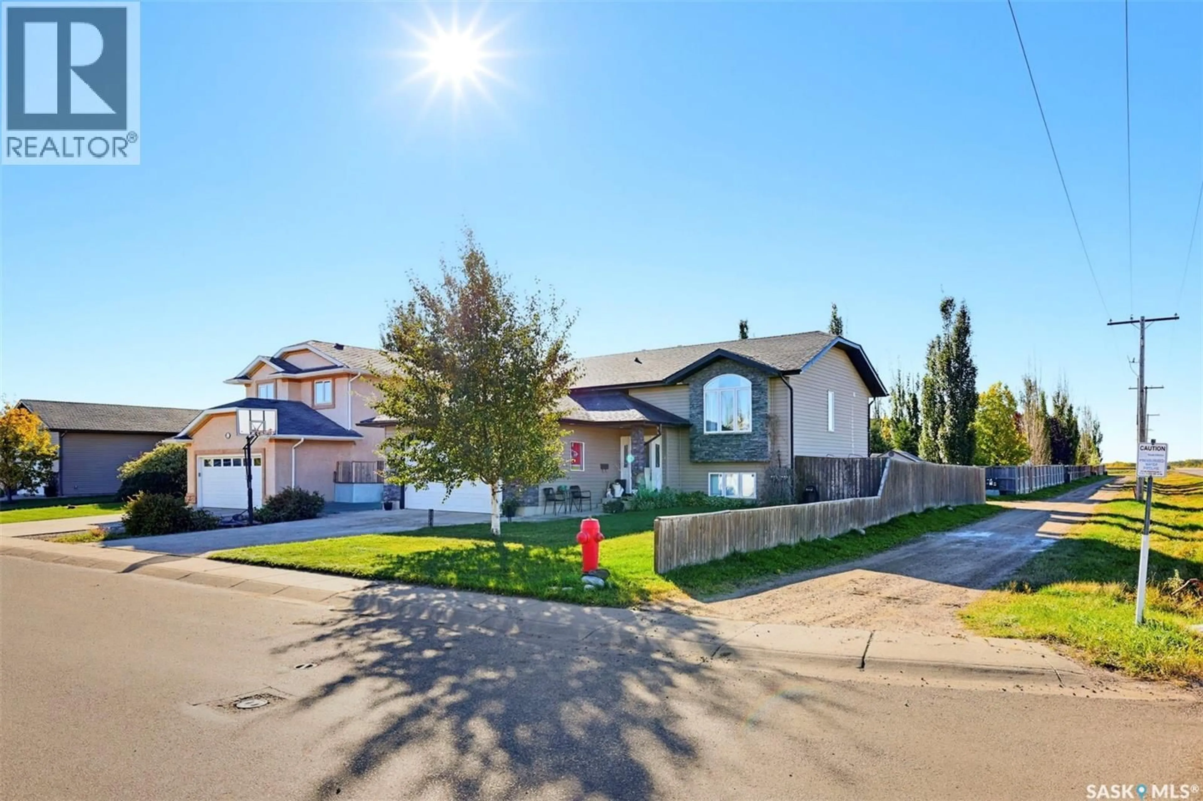 A pic from outside/outdoor area/front of a property/back of a property/a pic from drone, street for 101 LAKERIDGE DRIVE, Warman Saskatchewan S0K0A1