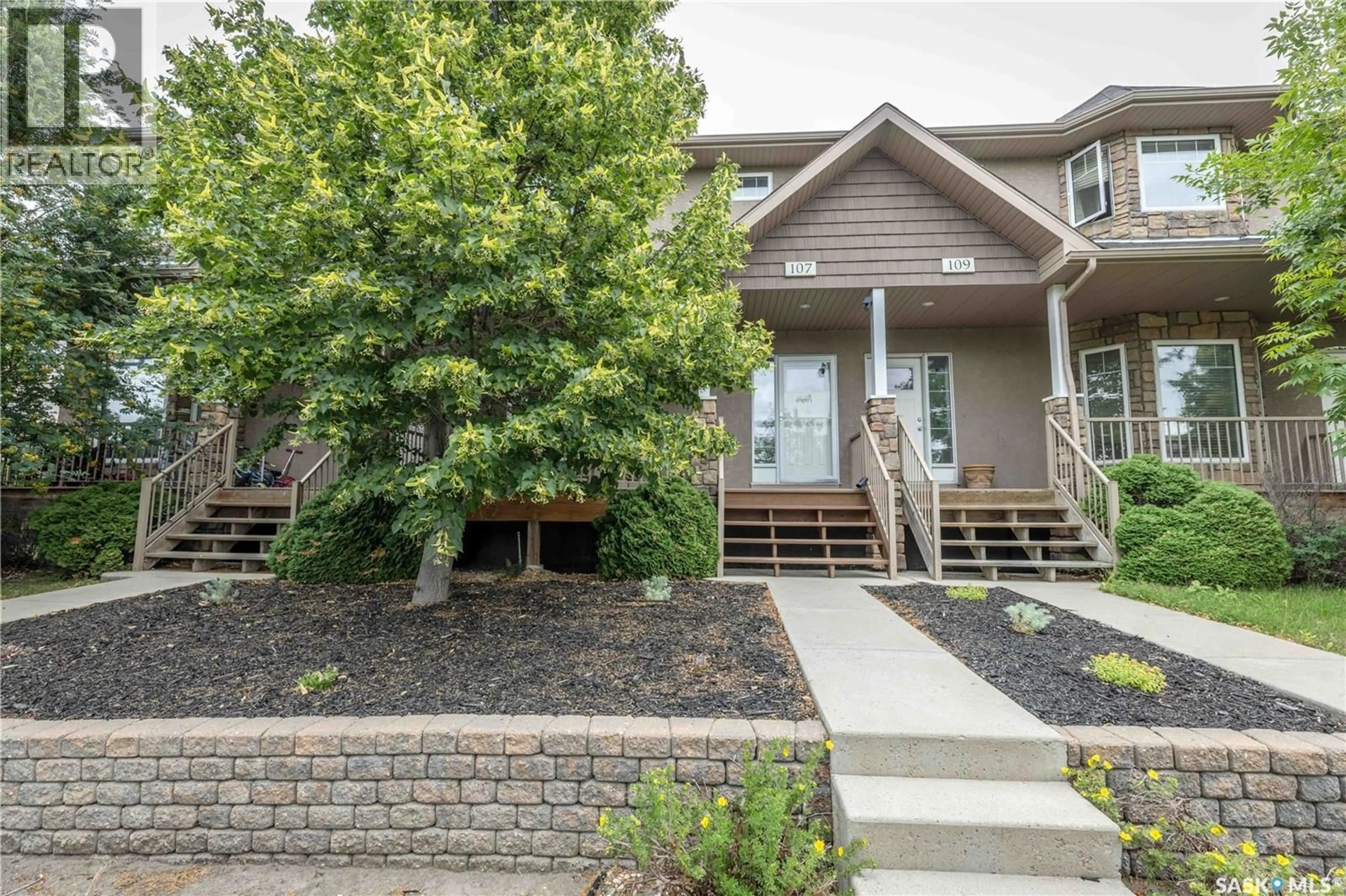 Home with brick exterior material, street for 107 GALLOWAY ROAD, Saskatoon Saskatchewan S7T0G2