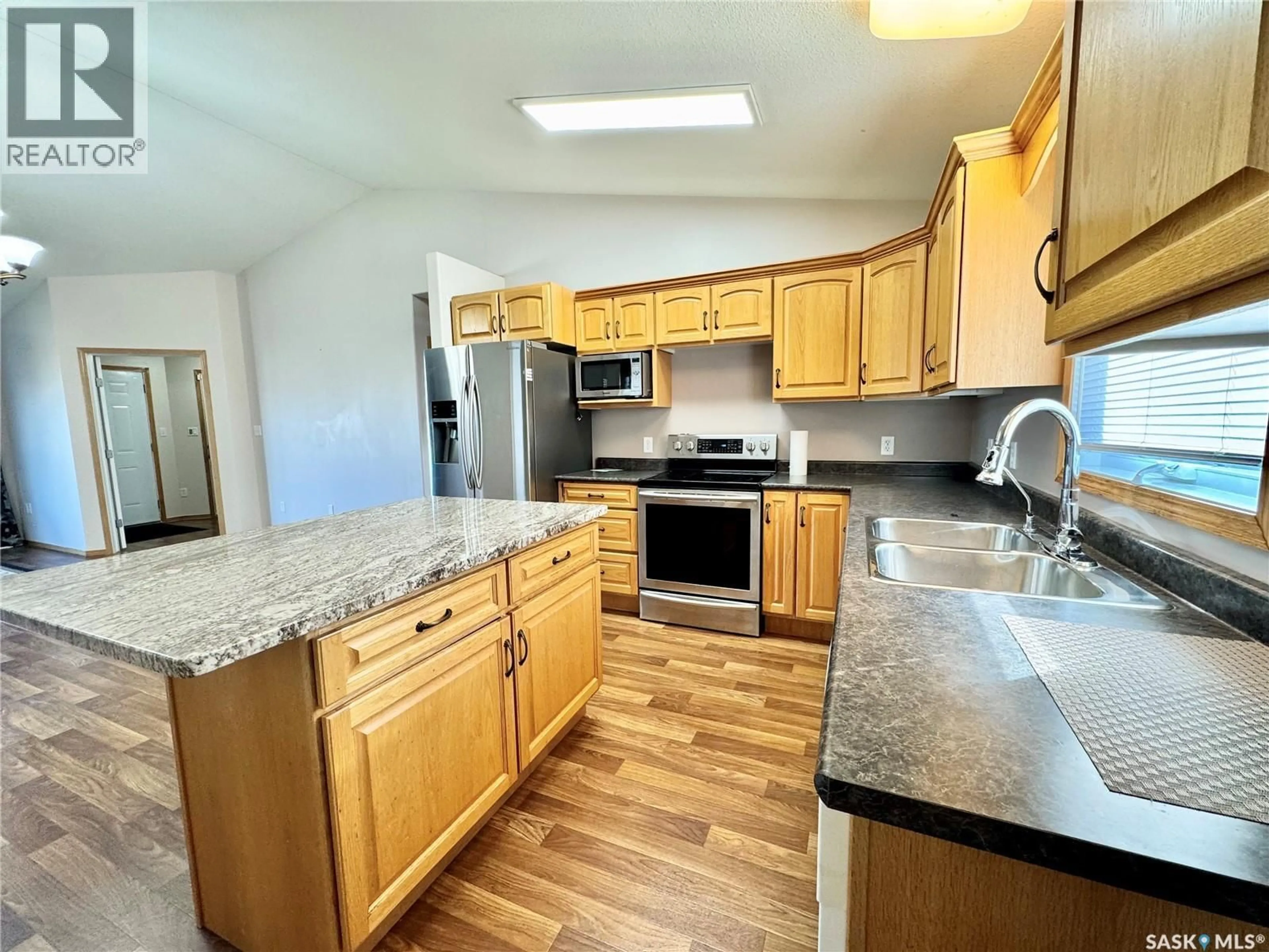 Open concept kitchen, unknown for 435 SOUTHWOOD DRIVE, Prince Albert Saskatchewan S6V8E5