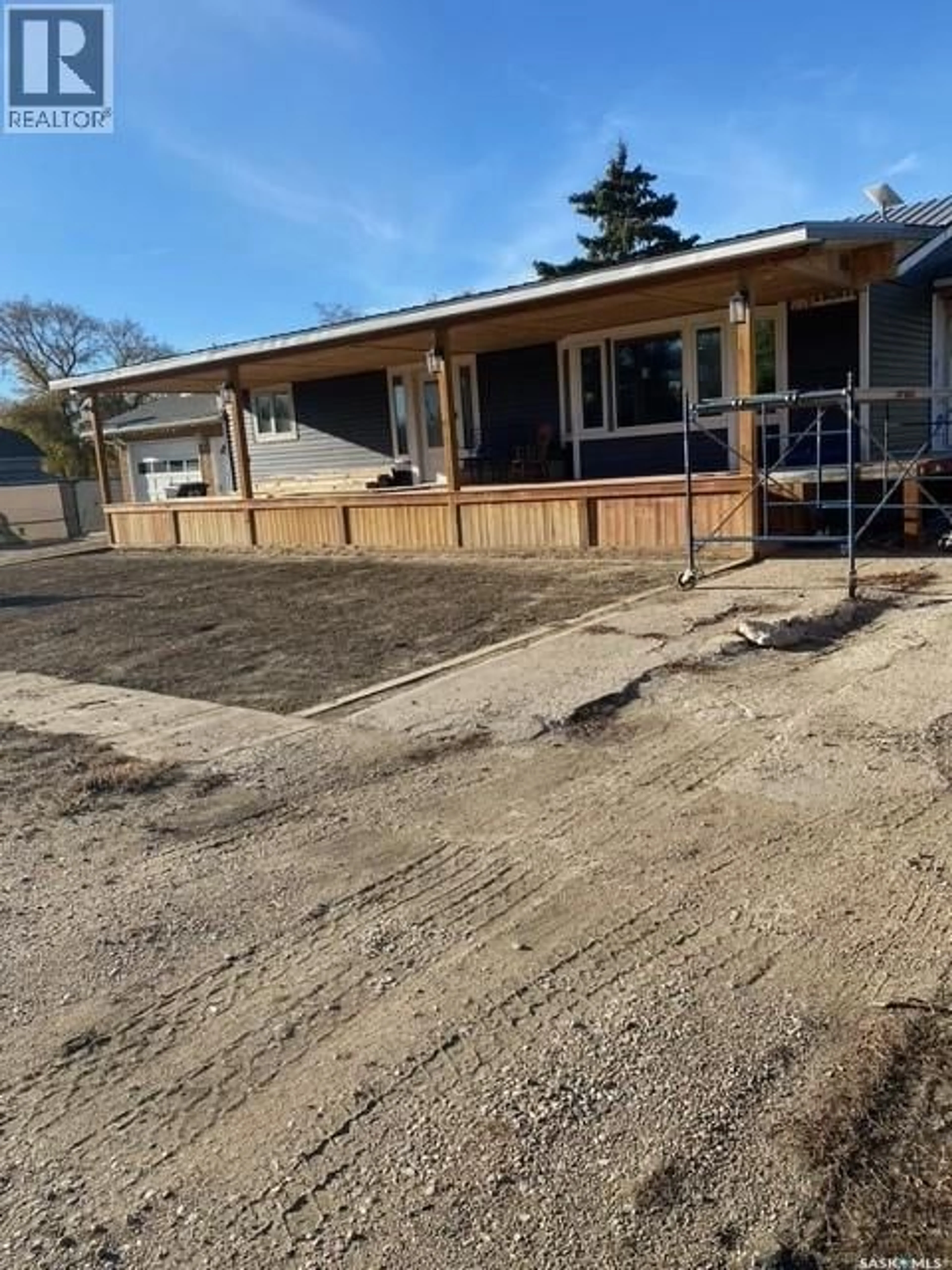 A pic from outside/outdoor area/front of a property/back of a property/a pic from drone, building for 216 2ND AVENUE, Wiseton Saskatchewan S0L3M0