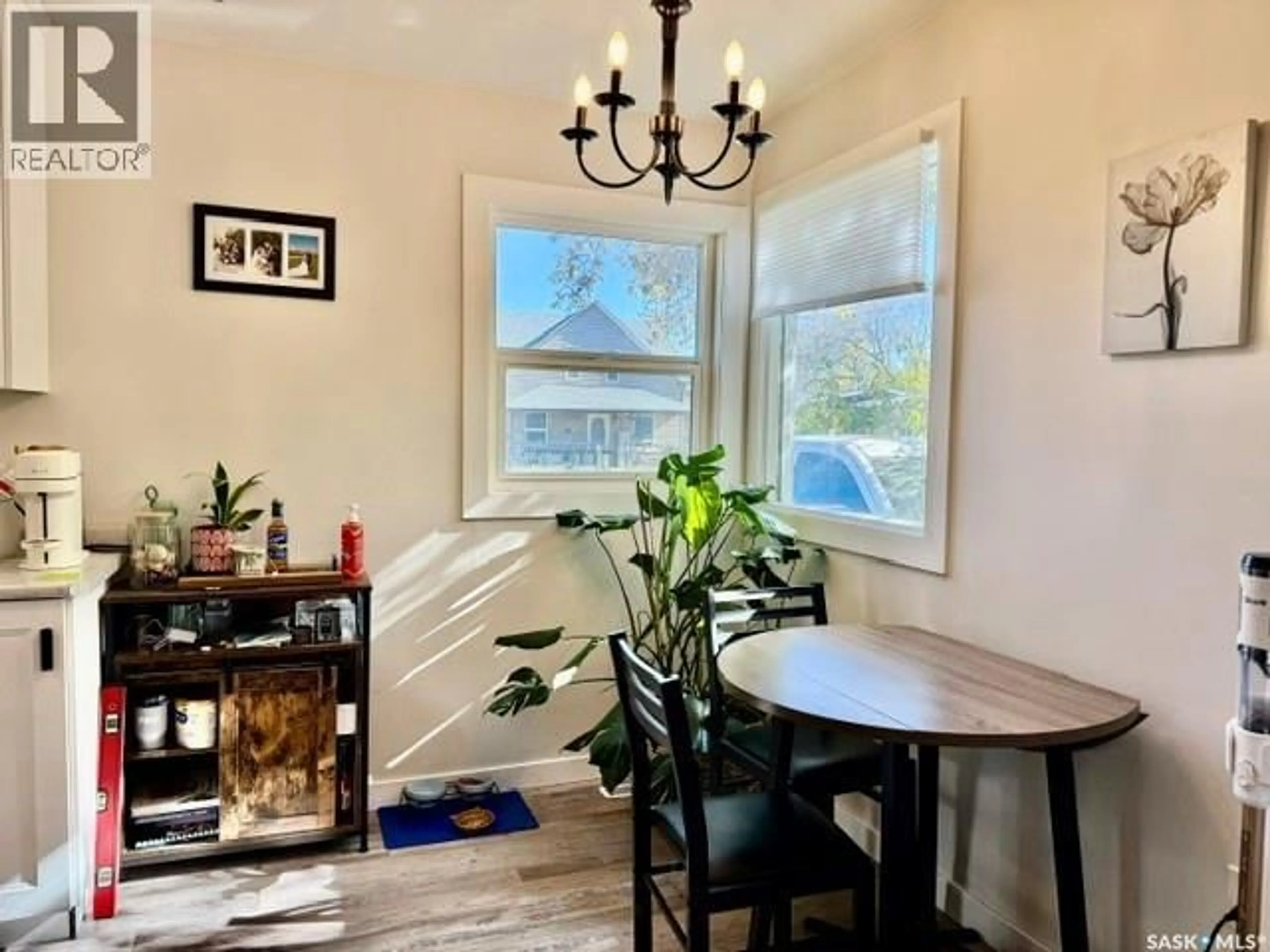 Dining room, wood/laminate floor for 731 13TH STREET, Humboldt Saskatchewan S0K2A0