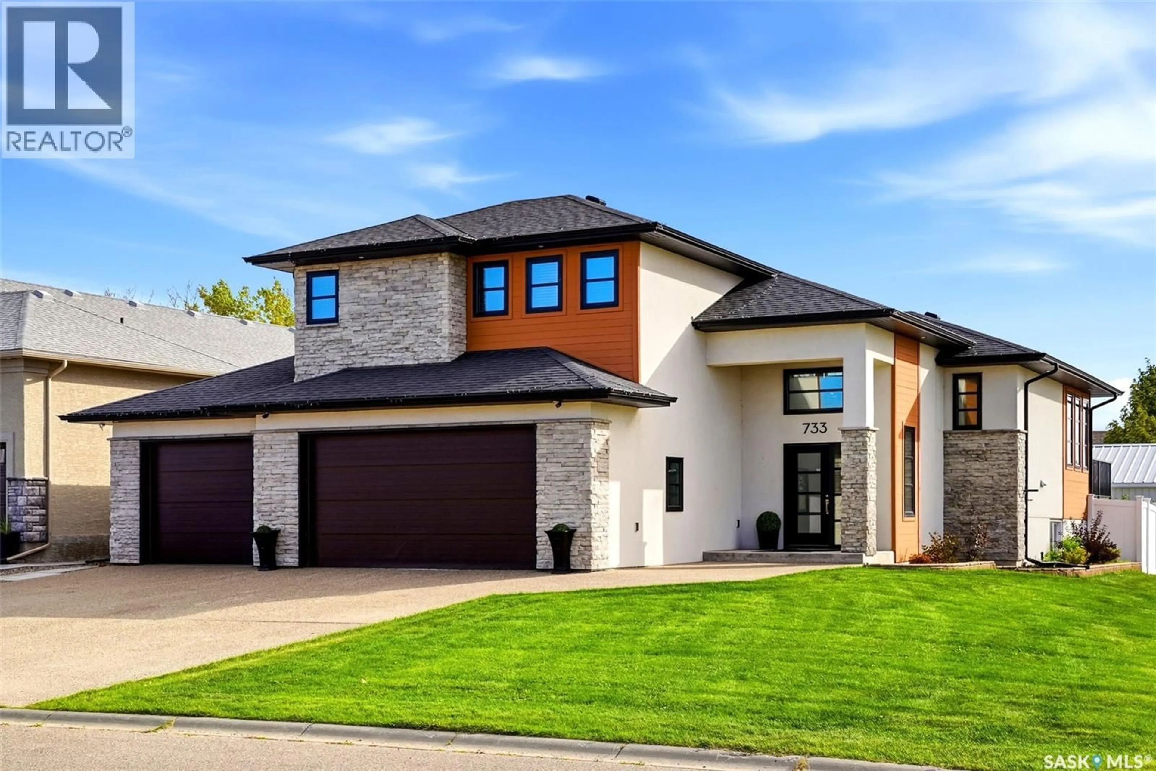 Home with brick exterior material, street for 733 3RD AVENUE, Pilot Butte Saskatchewan S0G3Z0