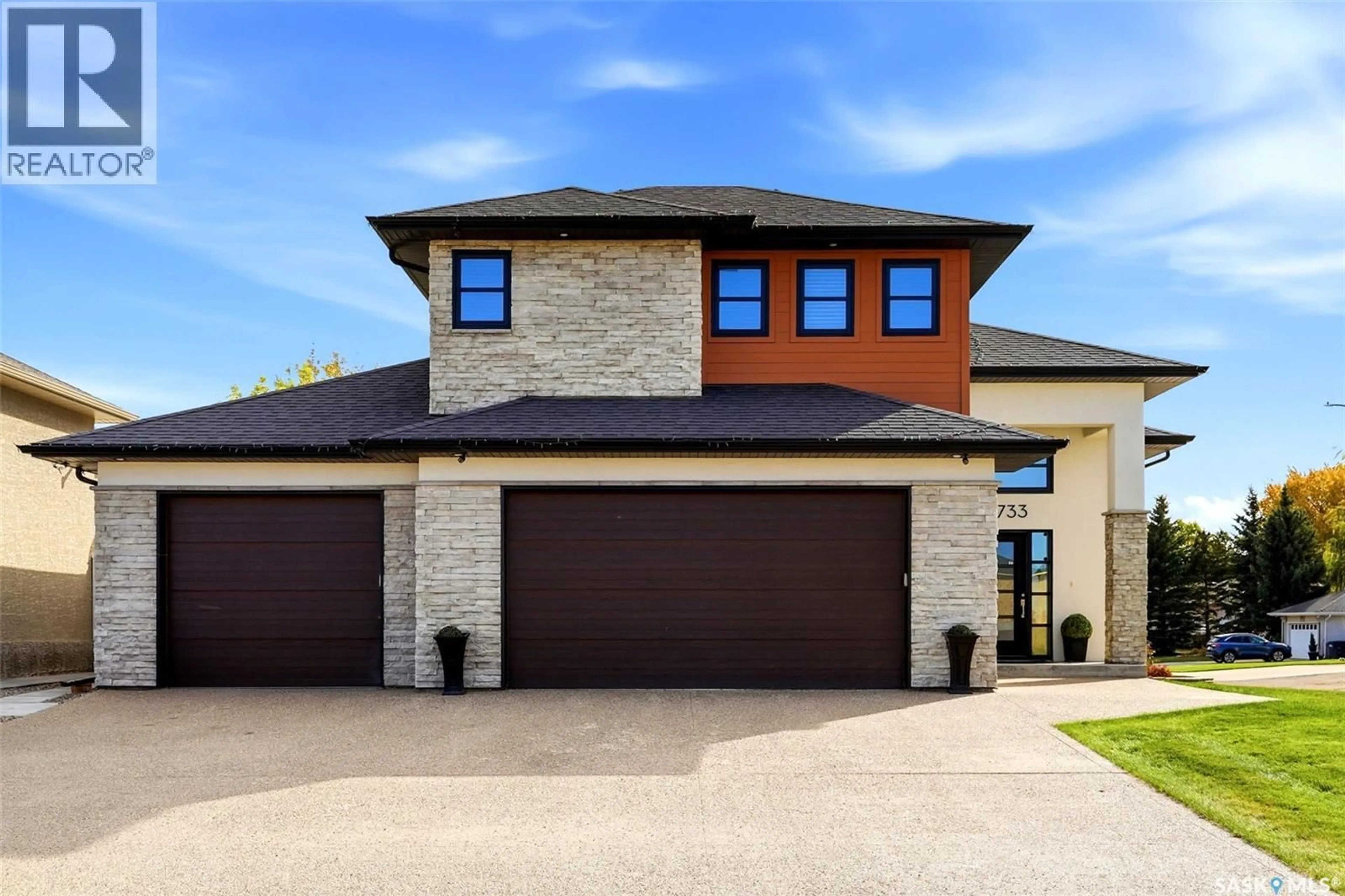 Home with brick exterior material, street for 733 3RD AVENUE, Pilot Butte Saskatchewan S0G3Z0