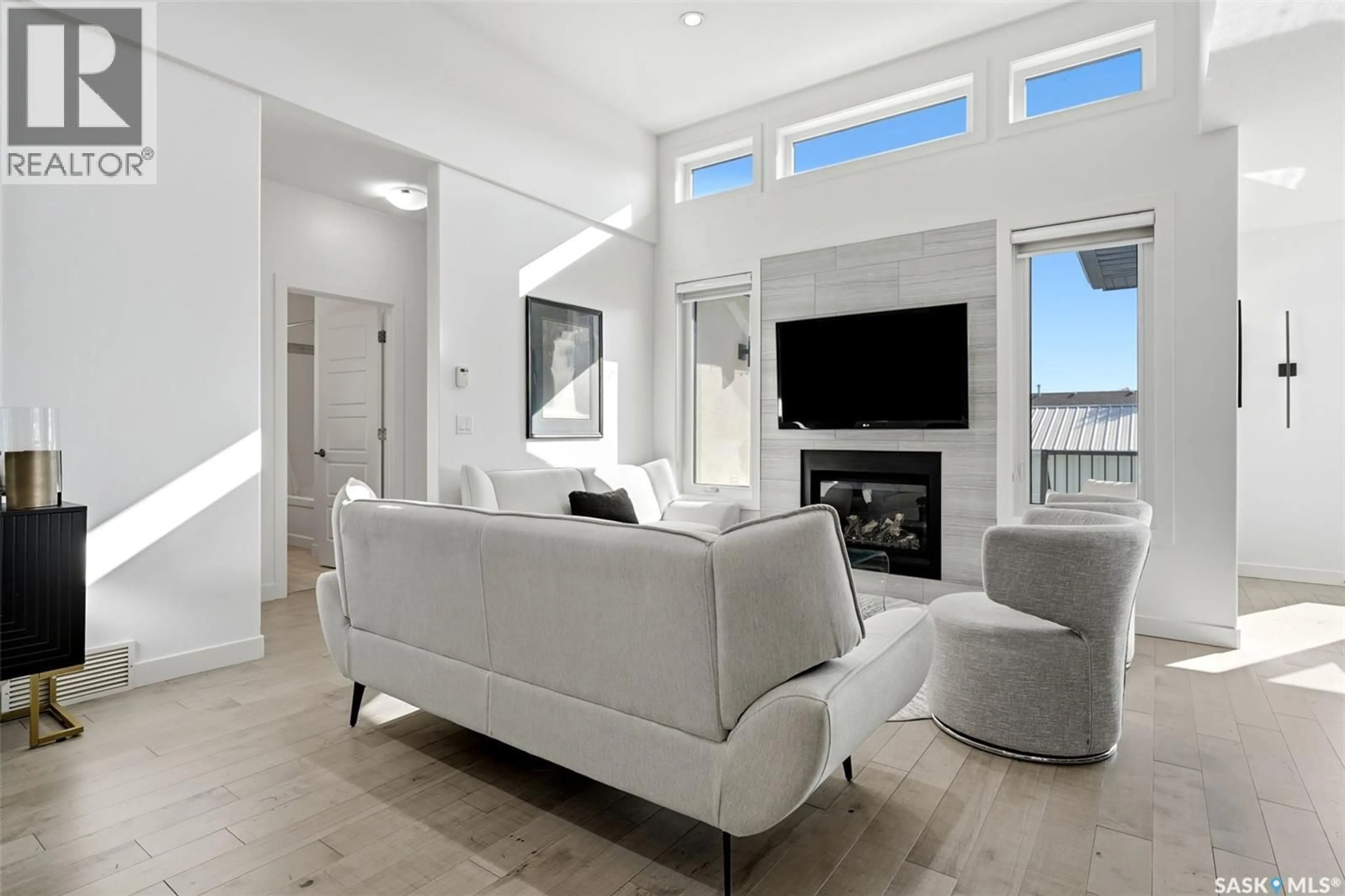 Living room with furniture, unknown for 733 3RD AVENUE, Pilot Butte Saskatchewan S0G3Z0