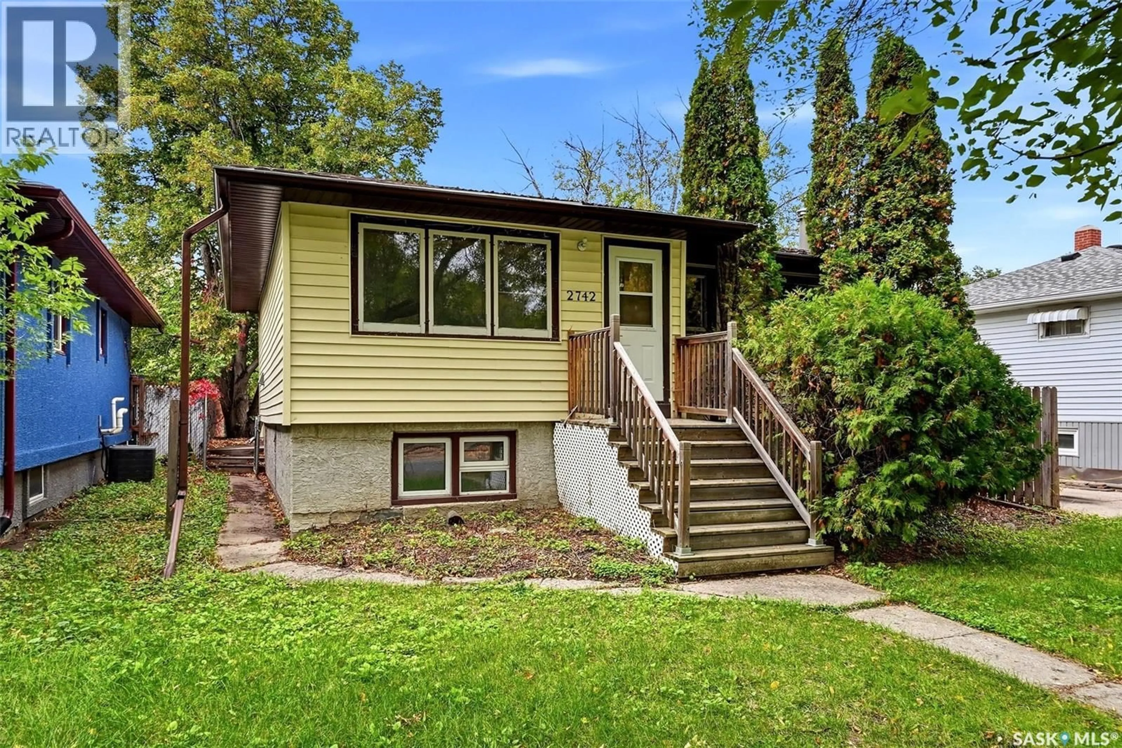 Home with vinyl exterior material, street for 2742 MCARA STREET, Regina Saskatchewan S4N2X1