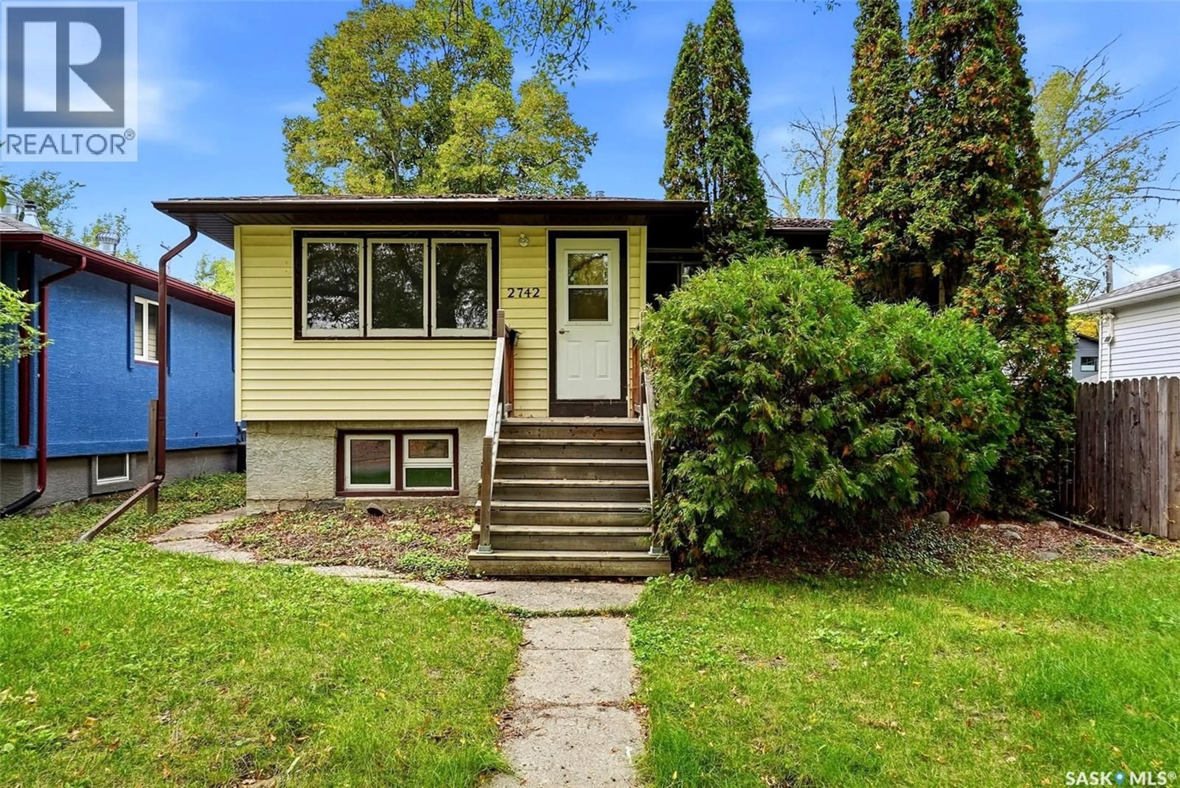 Home with vinyl exterior material, street for 2742 MCARA STREET, Regina Saskatchewan S4N2X1