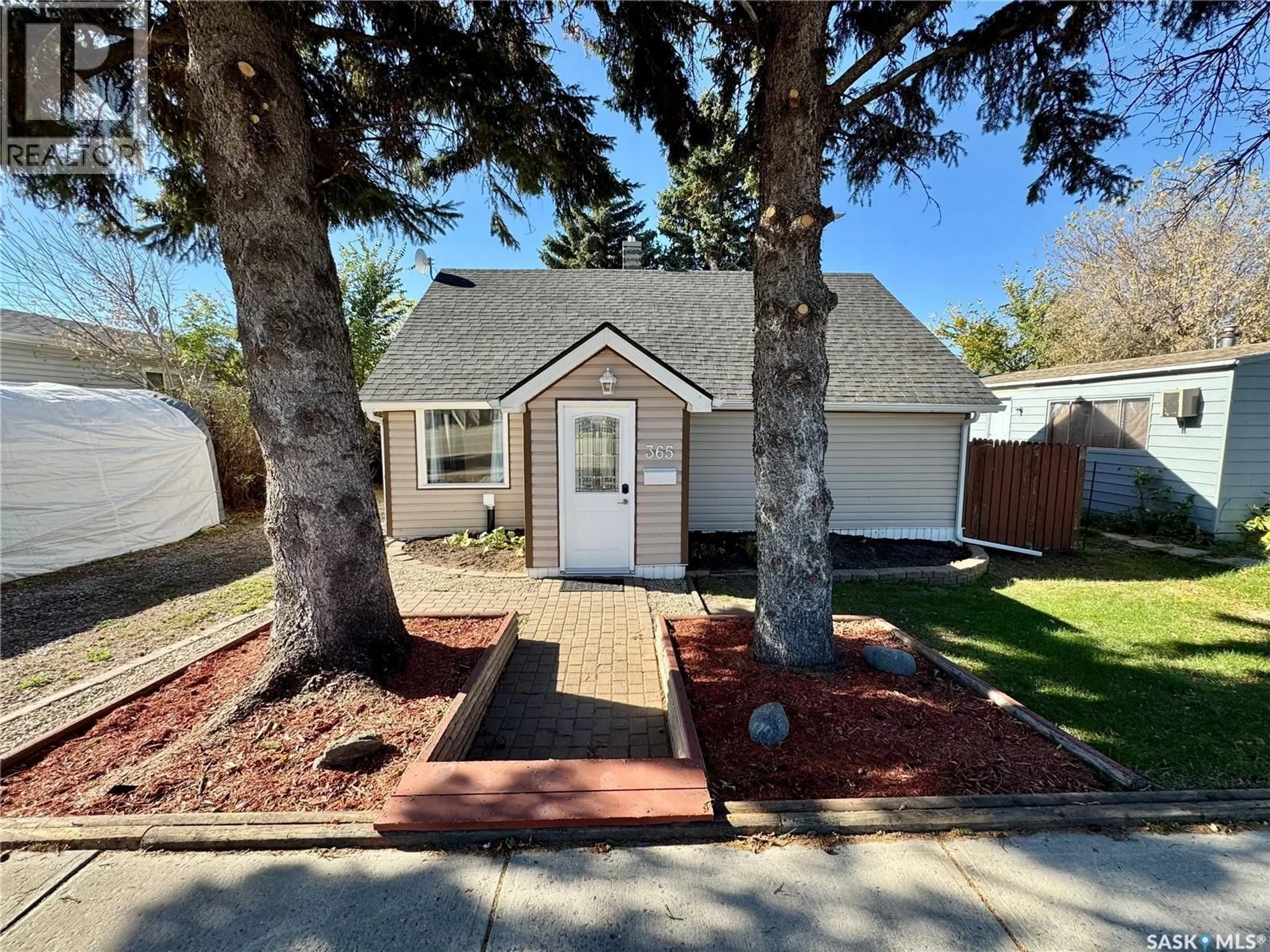 Home with vinyl exterior material, street for 365 KEATS STREET, Southey Saskatchewan S0G4P0