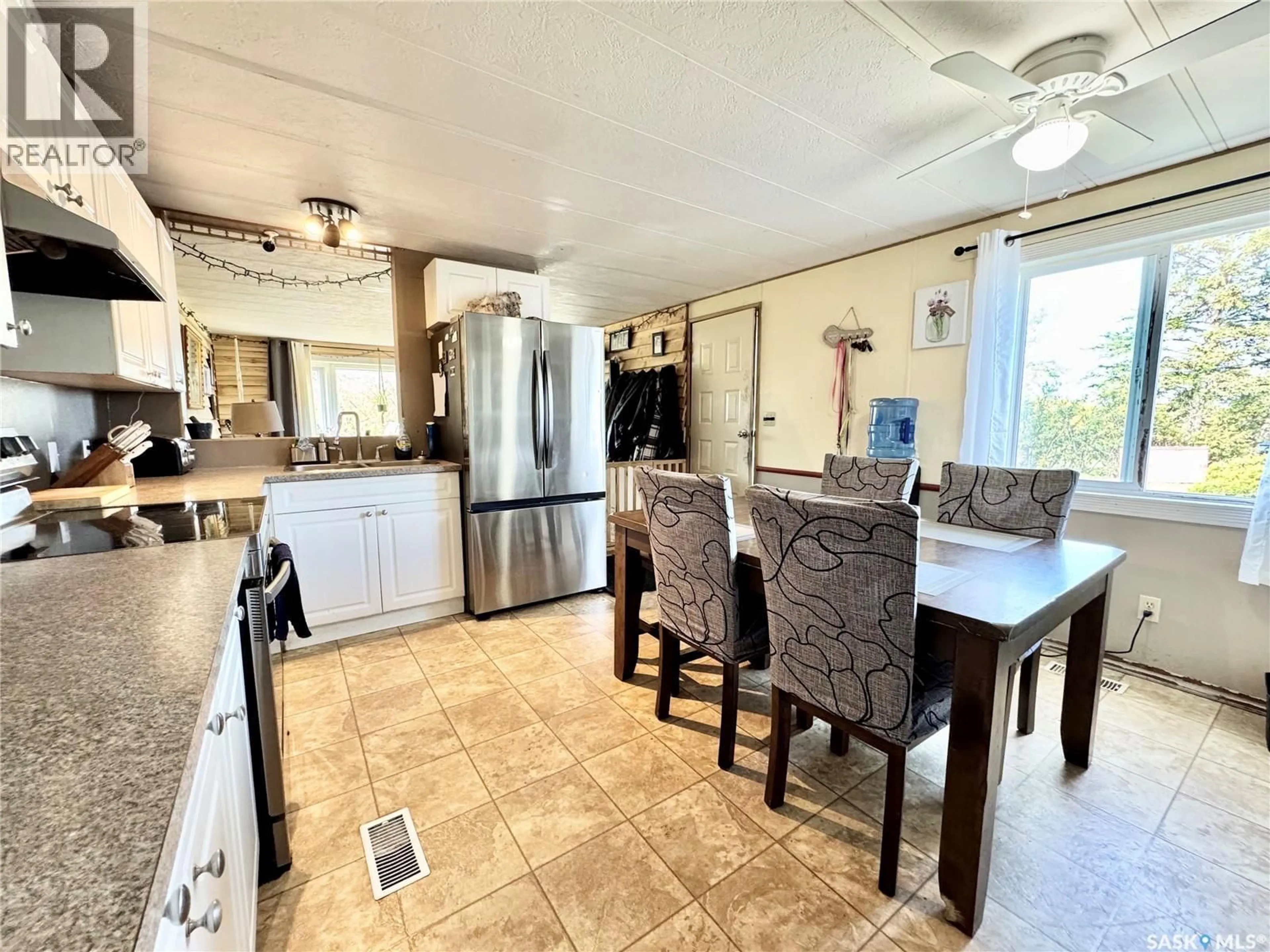 Open concept kitchen, ceramic/tile floor for 2 HWY 2 SOUTH ACREAGE, Prince Albert Rm No. 461 Saskatchewan S6V5P9