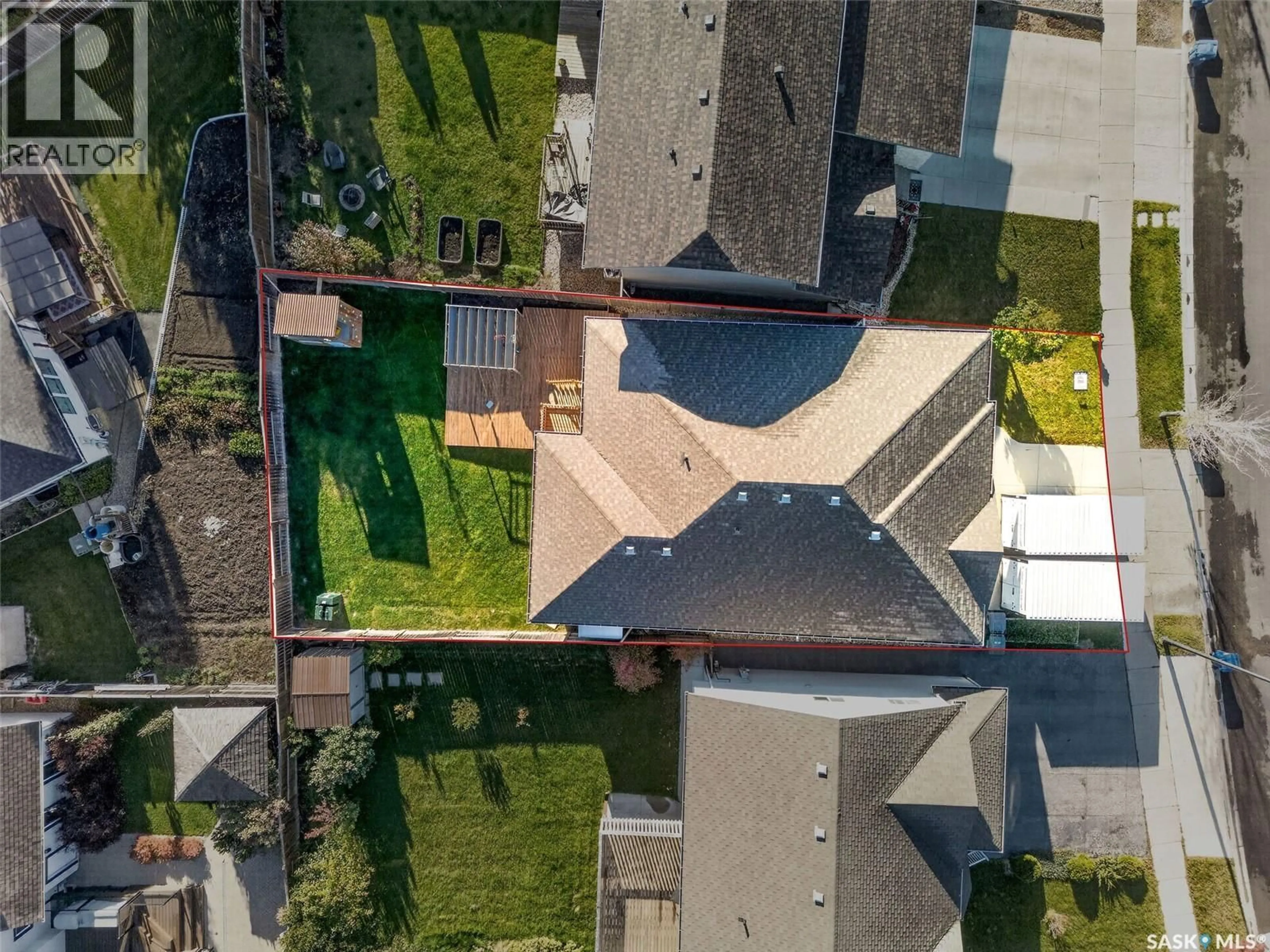 A pic from outside/outdoor area/front of a property/back of a property/a pic from drone, street for 1334 STENSRUD ROAD, Saskatoon Saskatchewan S7W0B9