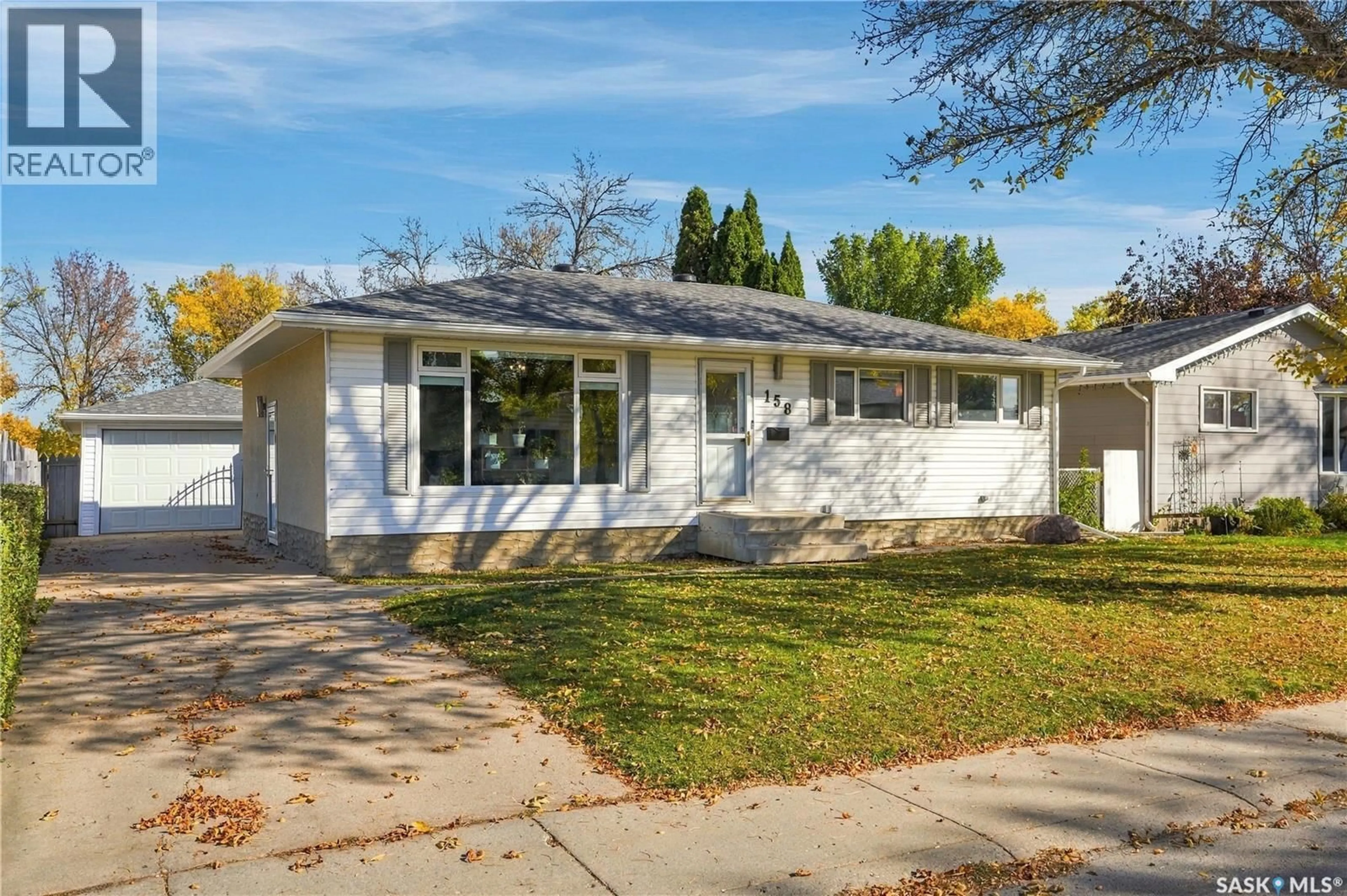 Home with vinyl exterior material, street for 158 SMALLWOOD CRESCENT, Saskatoon Saskatchewan S7L4Z6