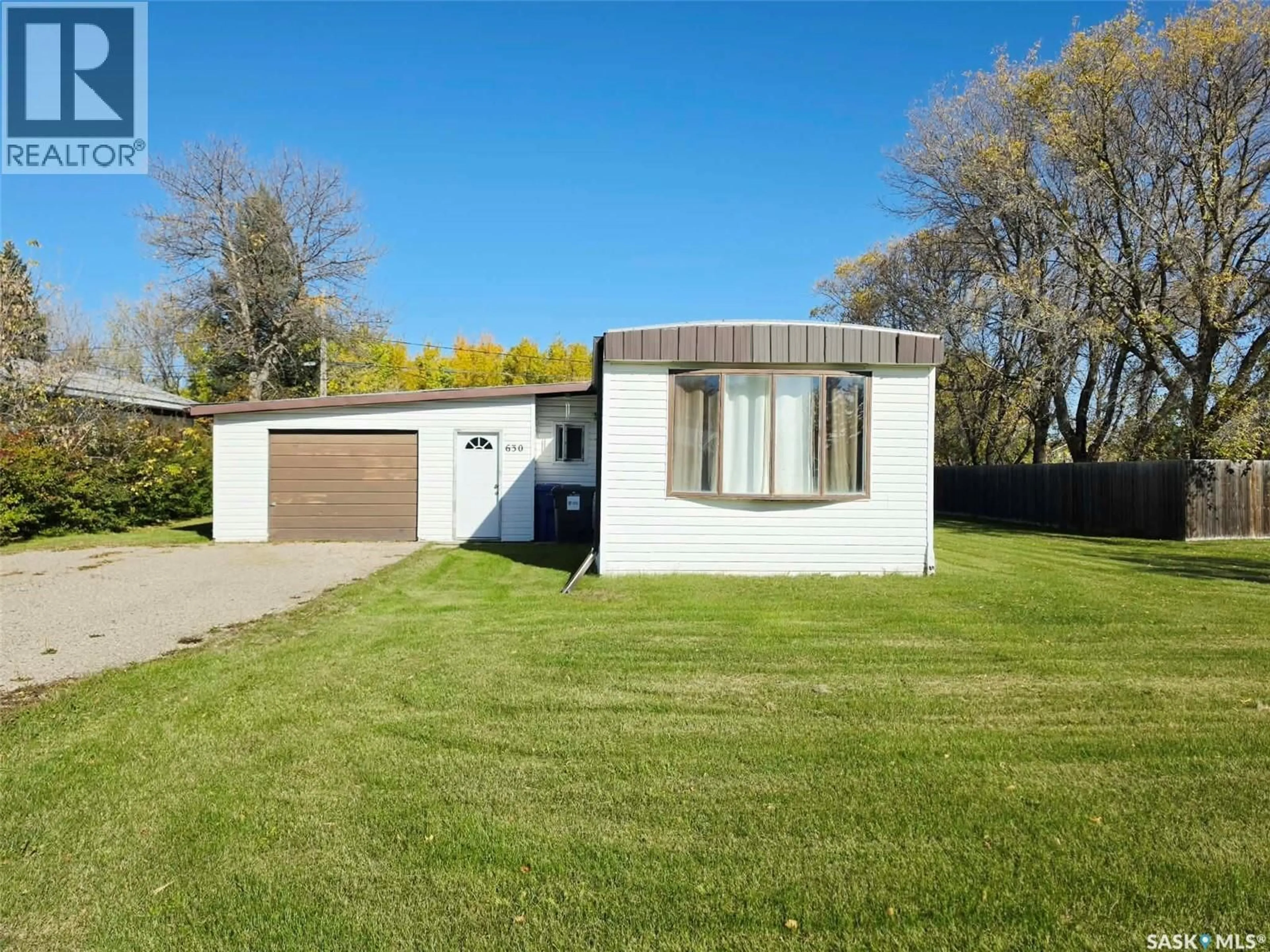 Home with vinyl exterior material, street for 630 MAPLE DRIVE, Esterhazy Saskatchewan S0A0X0