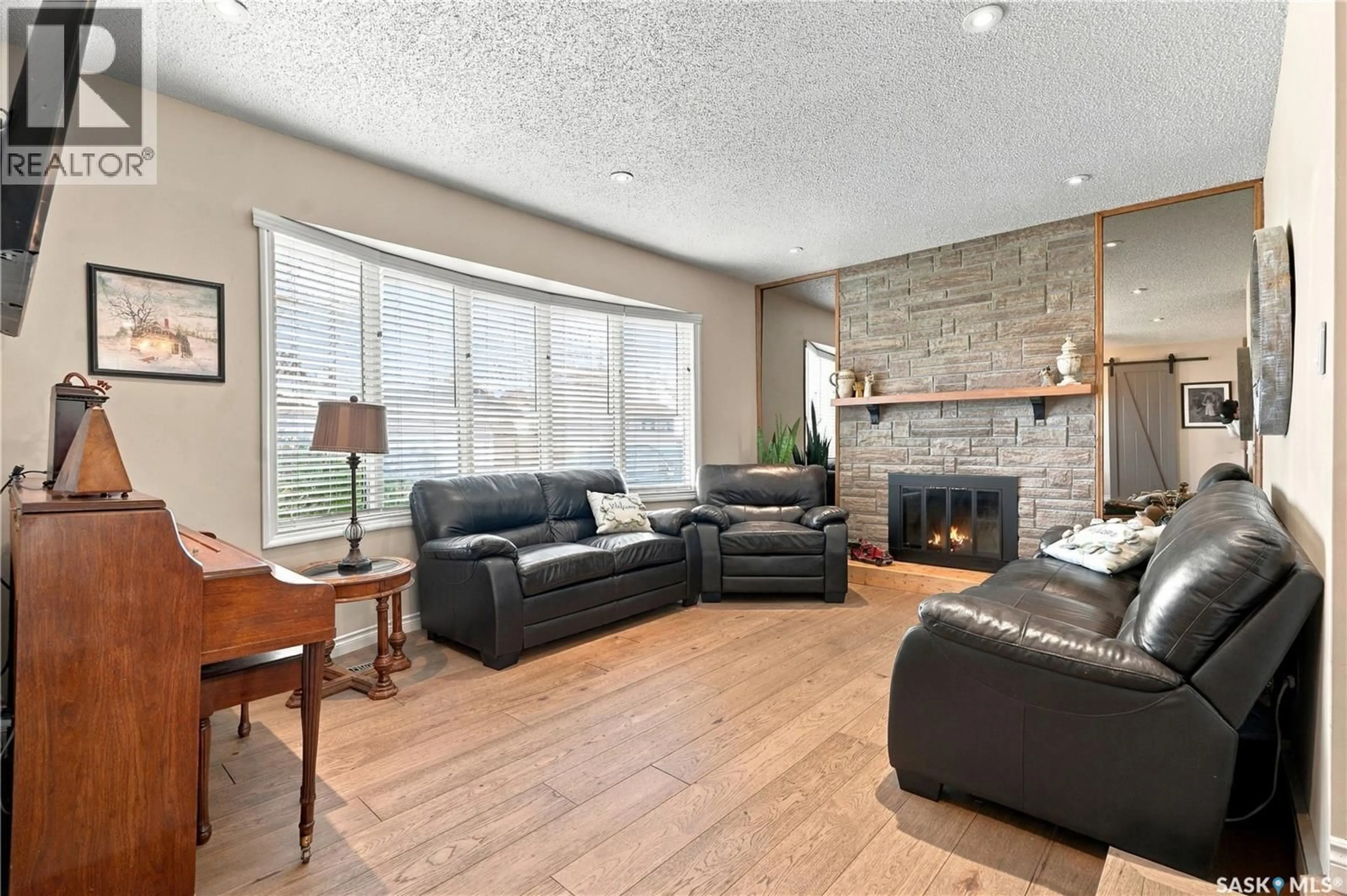 Living room with furniture, unknown for 222 SMITH ROAD, Saskatoon Saskatchewan S7M4Z5