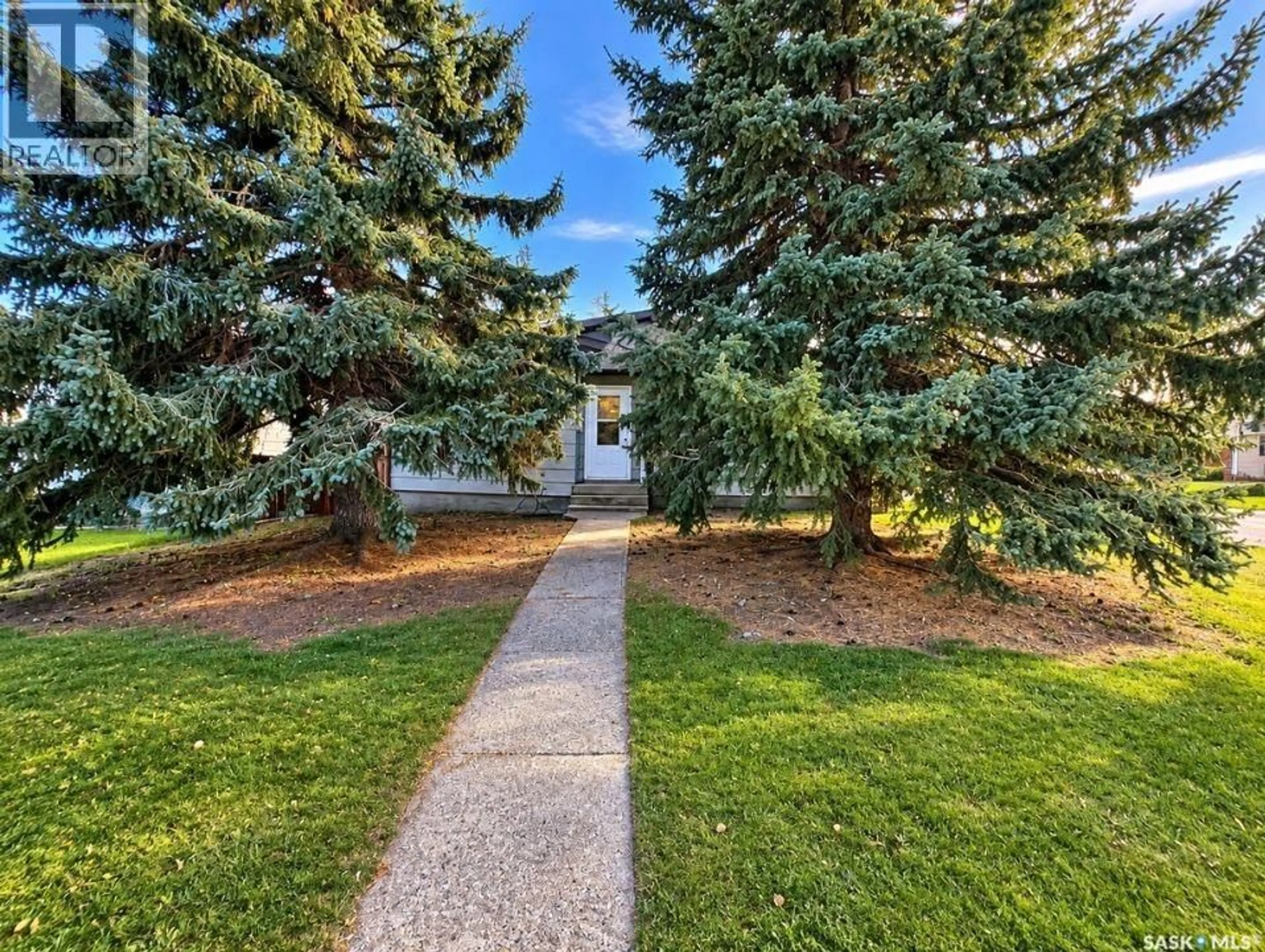 A pic from outside/outdoor area/front of a property/back of a property/a pic from drone, street for 302 COWIE CRESCENT, Swift Current Saskatchewan S9H4W7