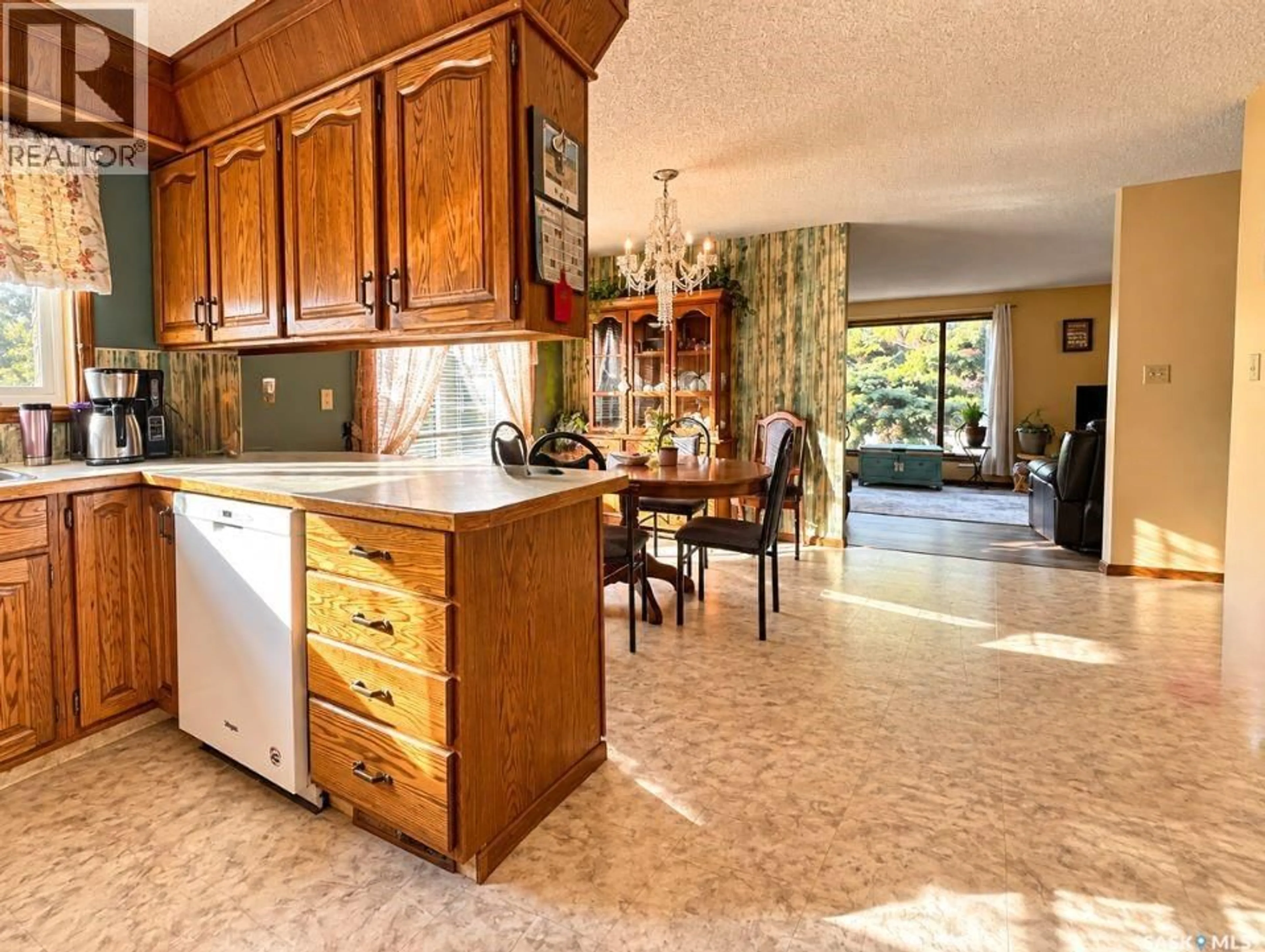 Open concept kitchen, ceramic/tile floor for 302 COWIE CRESCENT, Swift Current Saskatchewan S9H4W7