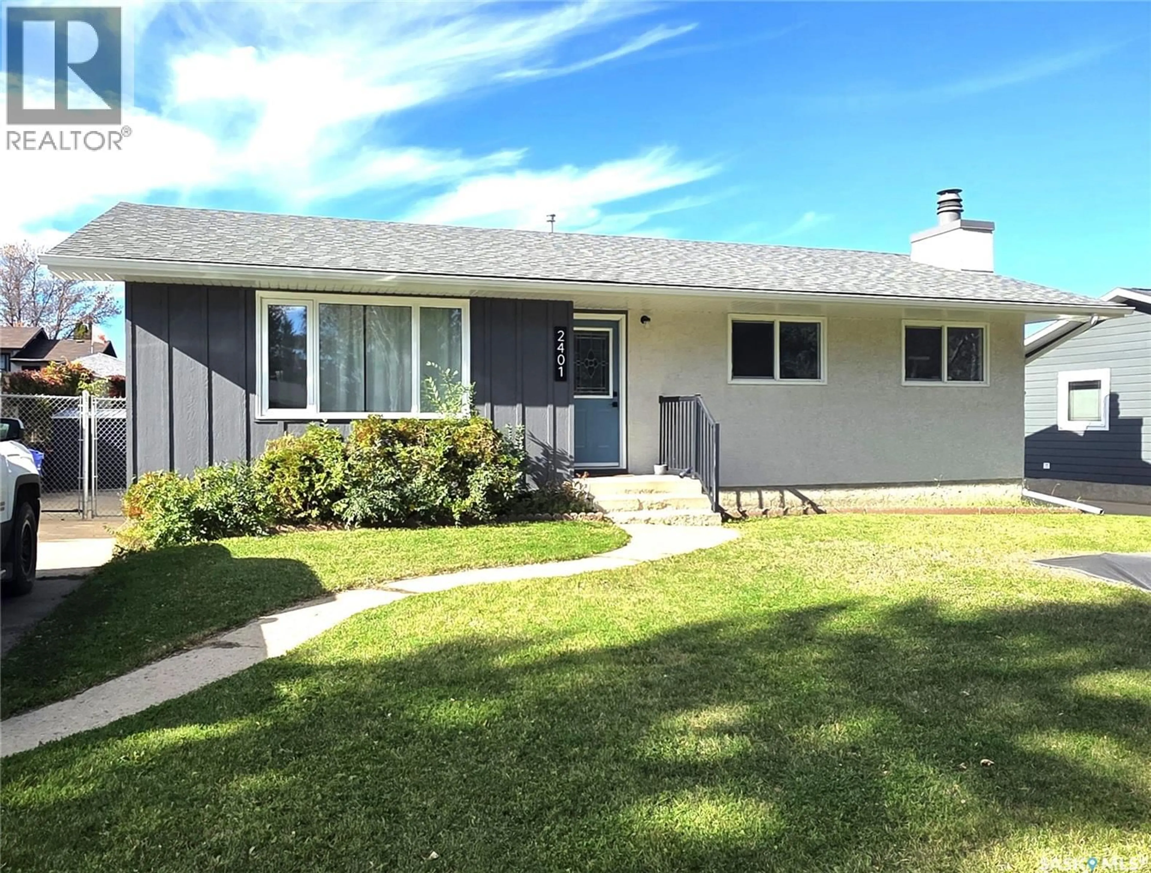 Home with vinyl exterior material, street for 2401 15TH 15TH AVENUE E, Prince Albert Saskatchewan S6V6H4