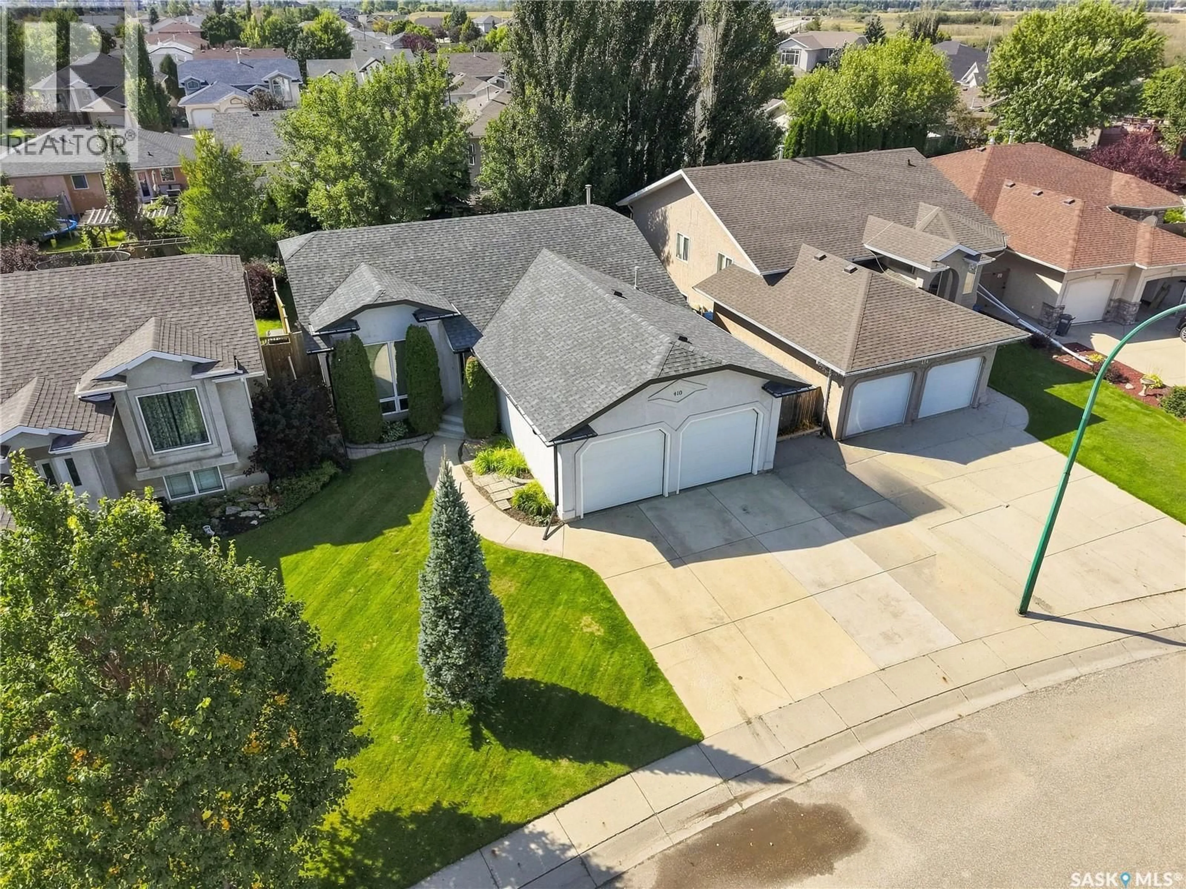 A pic from outside/outdoor area/front of a property/back of a property/a pic from drone, street for 410 BOURGONJE COURT, Saskatoon Saskatchewan S7S1L7