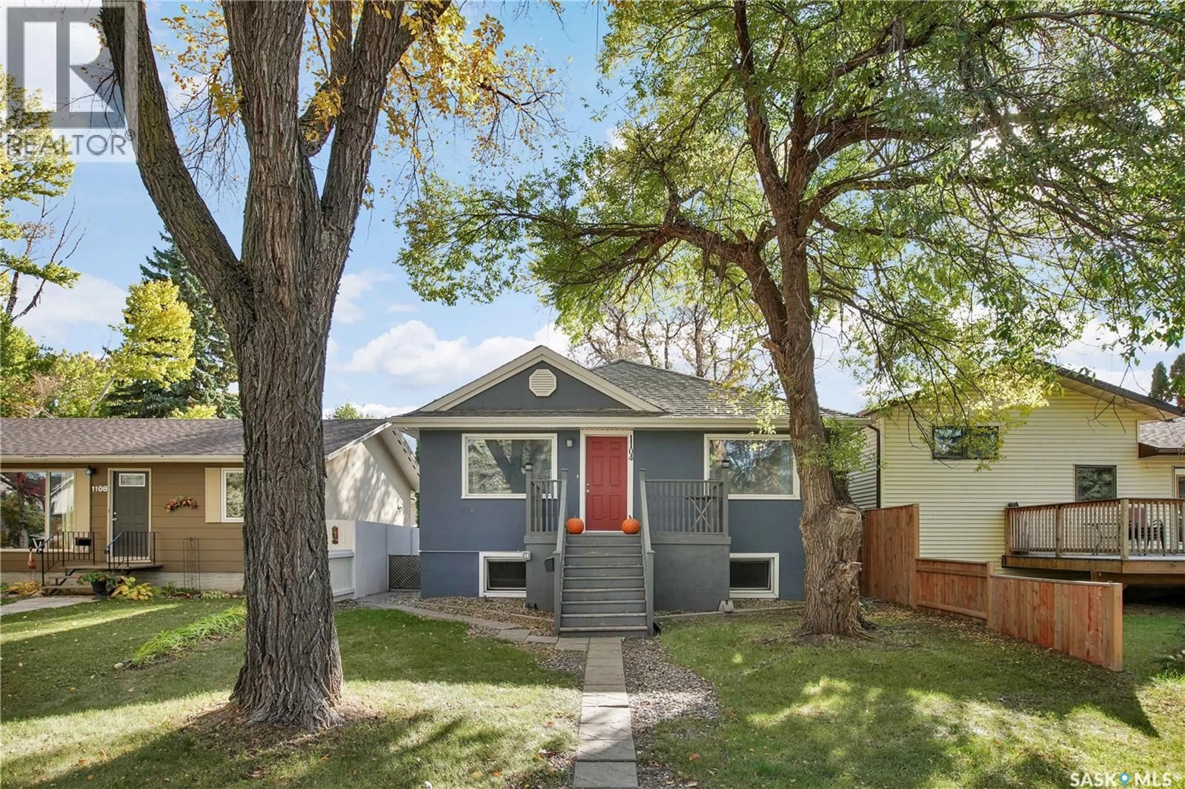 Home with vinyl exterior material, street for 1104 4TH STREET, Saskatoon Saskatchewan S7H1K8