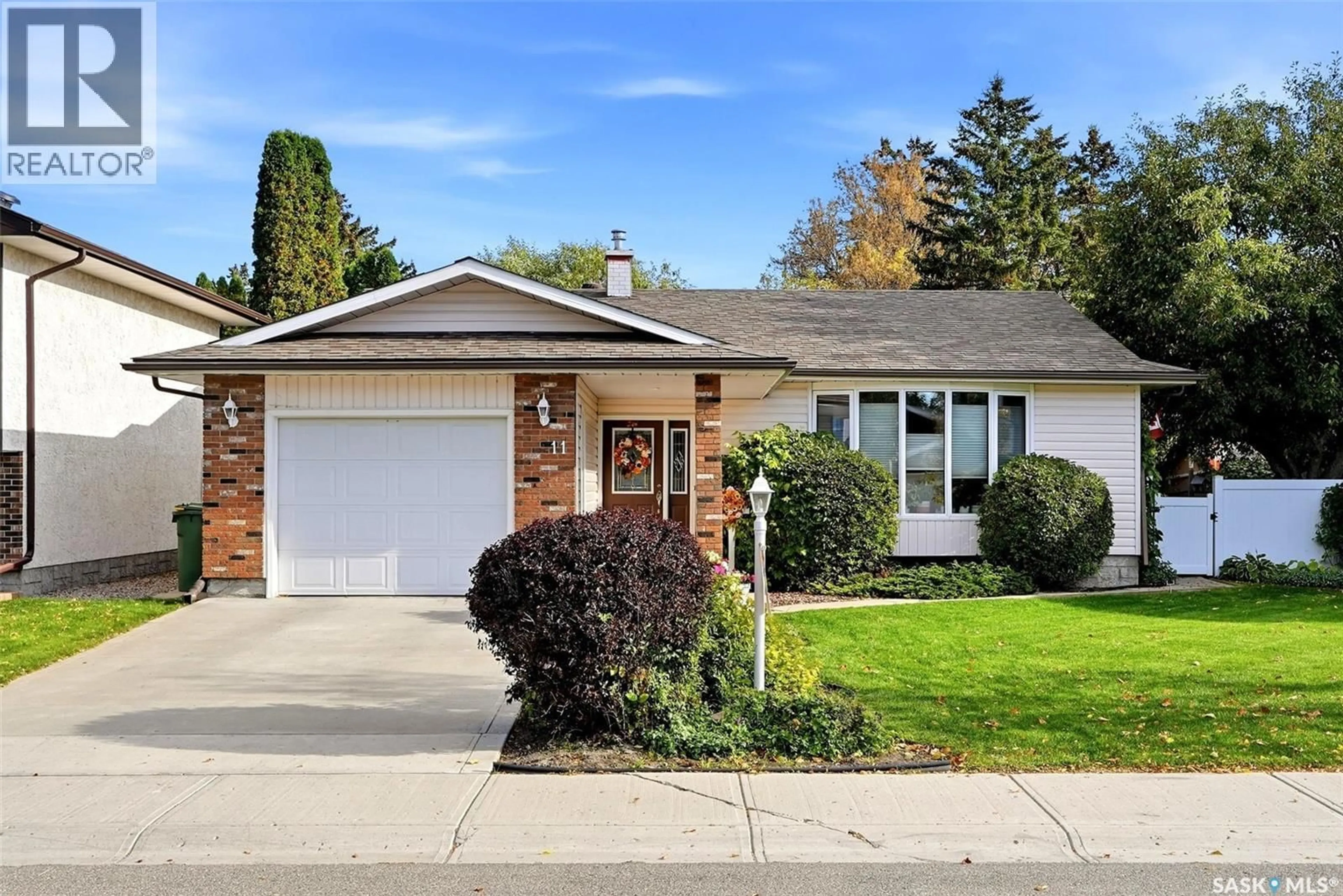 Home with vinyl exterior material, street for 11 GREEN MEADOW ROAD, Regina Saskatchewan S4V0A4